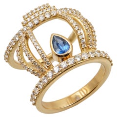 Hikari Ring aus 18 Karat Gelbgold mit Diamanten und einem Saphir