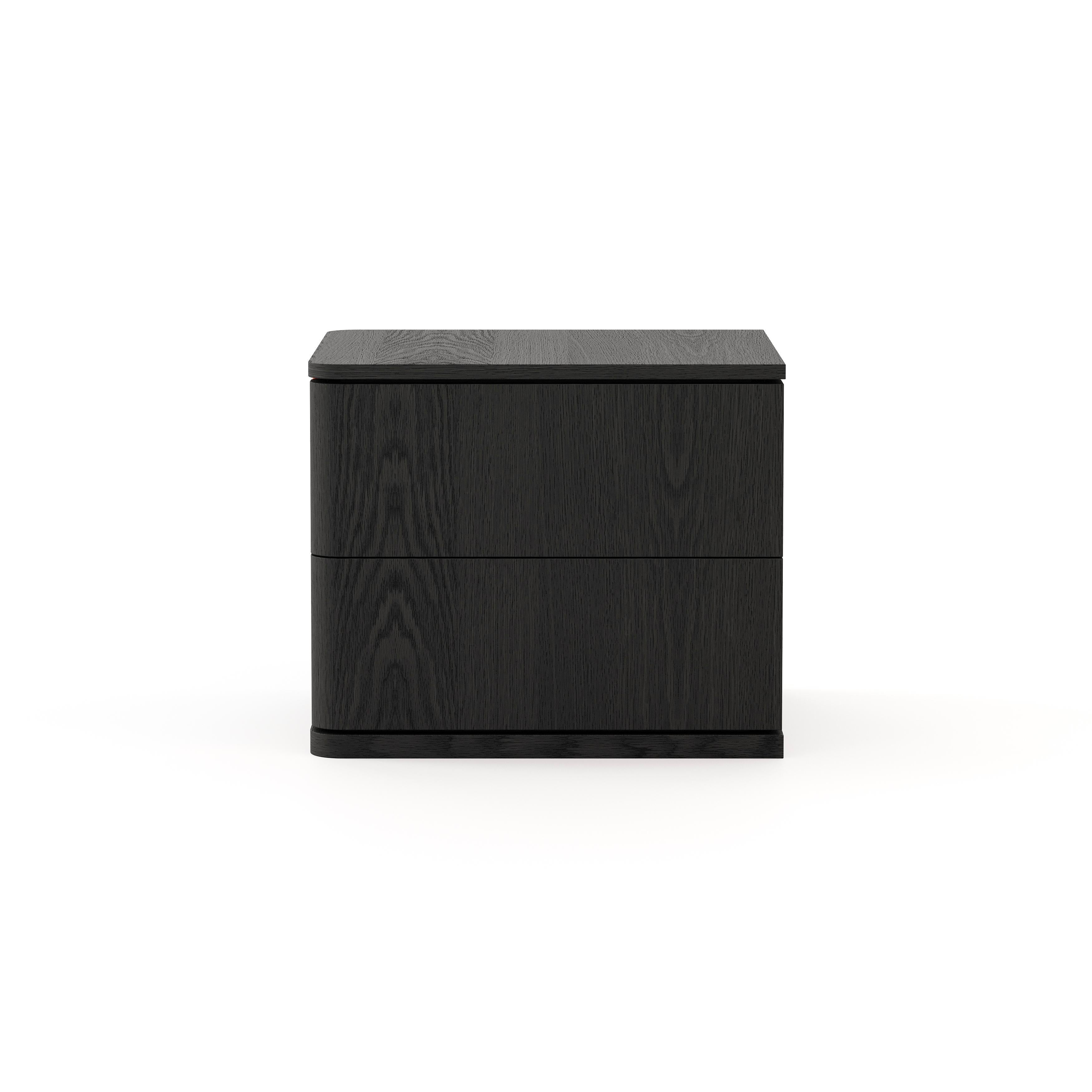 Hilary bedside table by Laskasas is genteel and attractive. This minimal nightstand is perfect for simple and functional Scandi-style bedrooms. A beautifully proportioned piece with drawers made of dark wood.

* Available in different finishes.
**