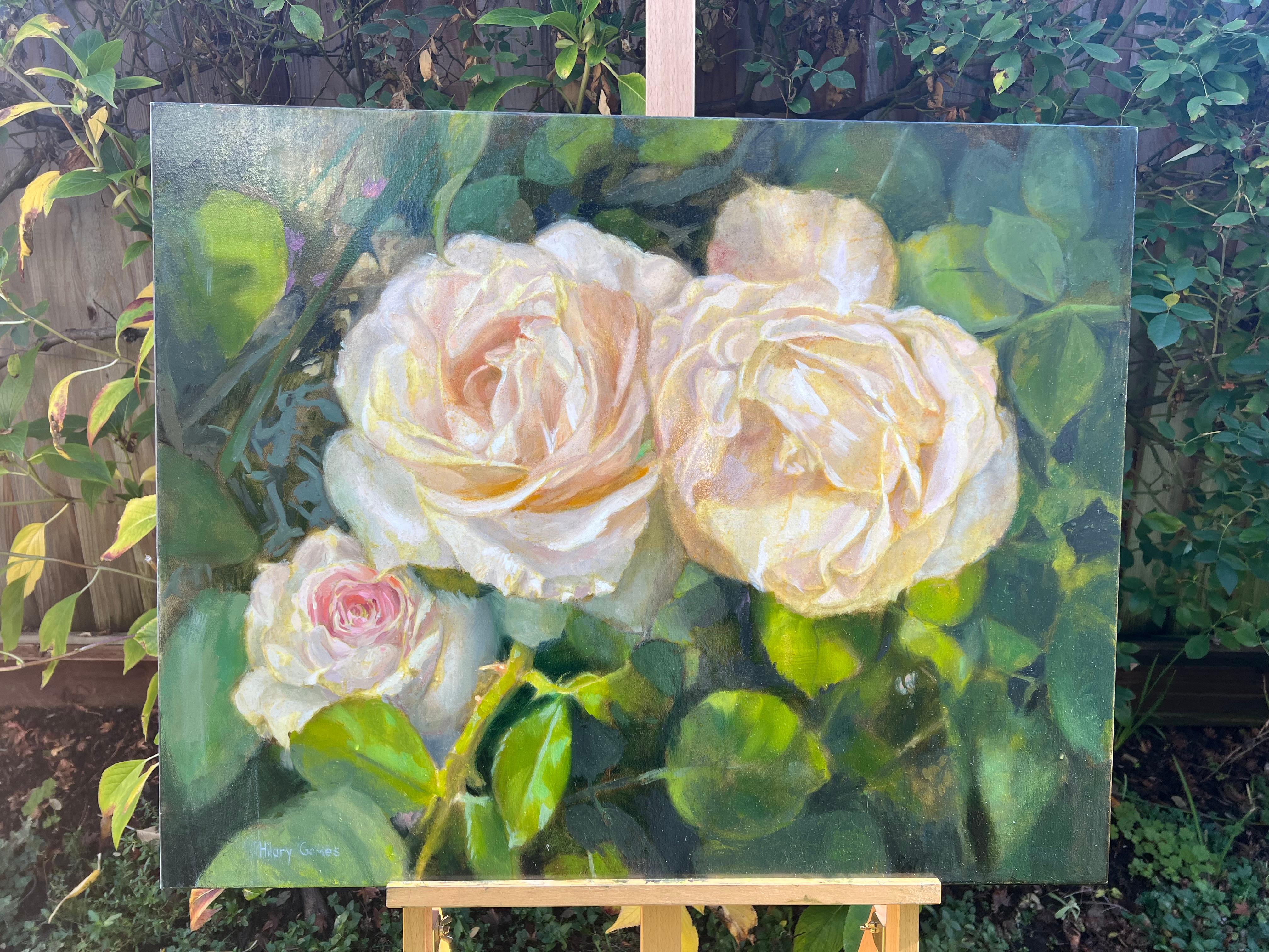 <p>Artist Comments<br>Light peach roses bloom from a bed of thriving leaves, with the soft edges of their petals displaying their delicate nature. The sun casts a gentle glow on the garden, imparting a classical aura to the scene. The grisaille