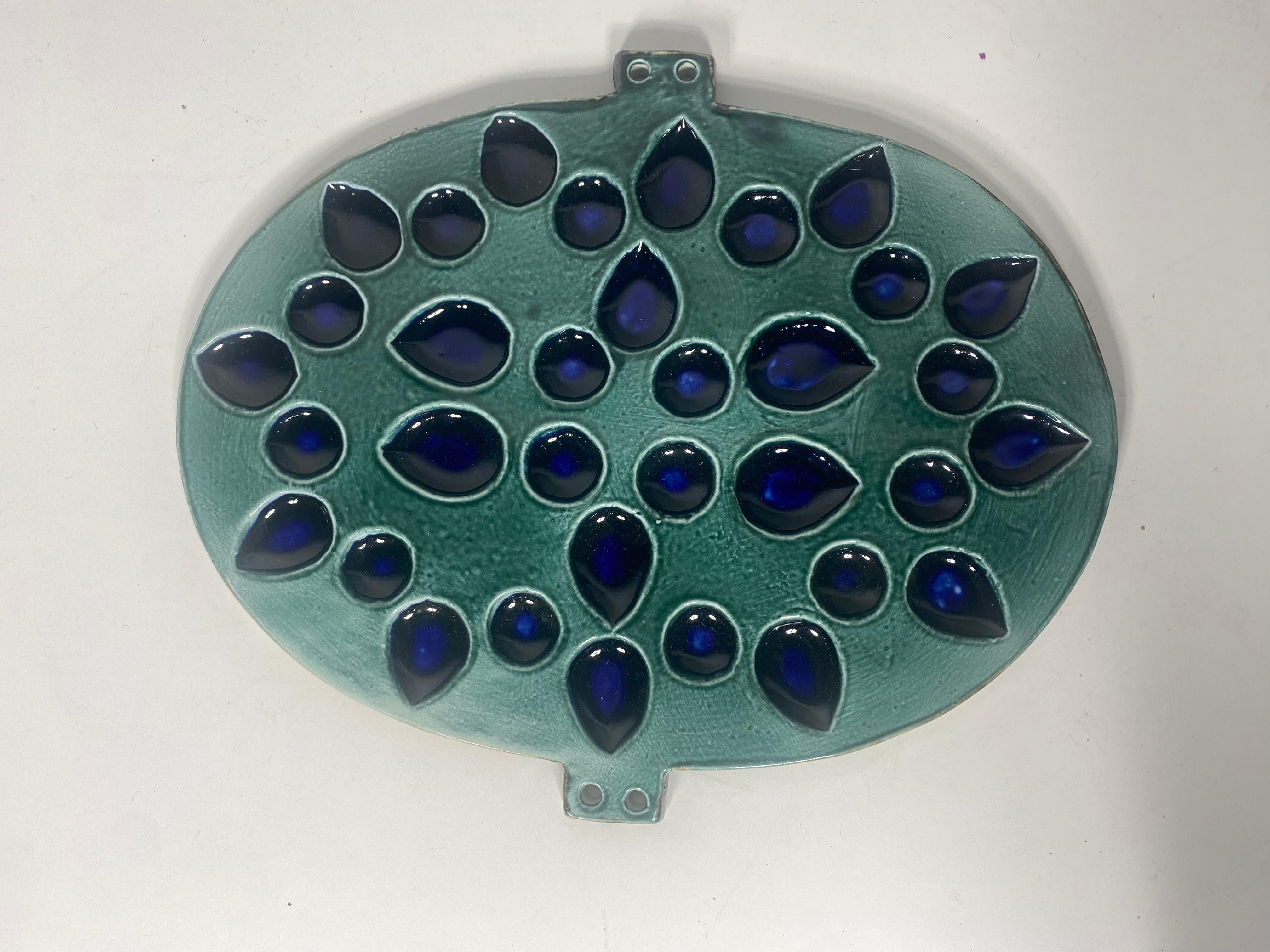 Hilkka Säynäjärvi for Arabia. Unique glazed ceramic wall plaque. Beautiful glaze in blue and green shades, 1960s.
Measures: 28 x 23 cm.  1 1