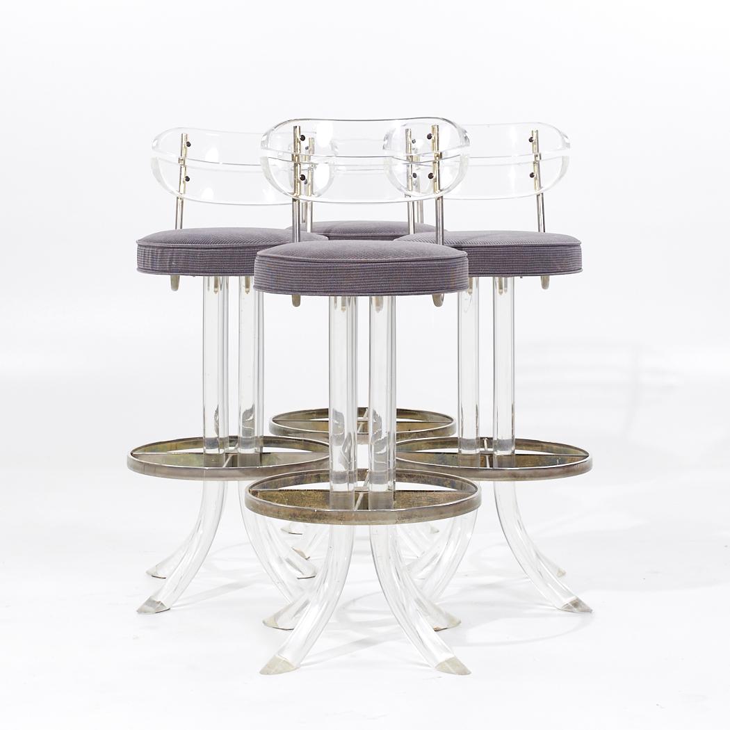 Hill Manufacturing Mid Century Lucite and Chrome Barstools - Set of 4

Each barstool measures: 17 wide x 20.5 deep x 37.25 high, with a seat height of 29 inches

All pieces of furniture can be had in what we call restored vintage condition. That