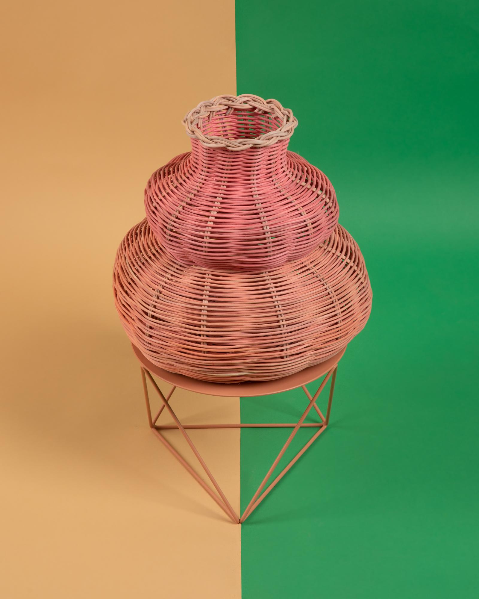 The Hillary Vase is hand dyed and woven with reed in our Chicago studio. Inspired by forms in ancient Greek ceramics, the material language of this vessel brings together the rich craft history of weaving with 3 dimensional form.

All of Studio