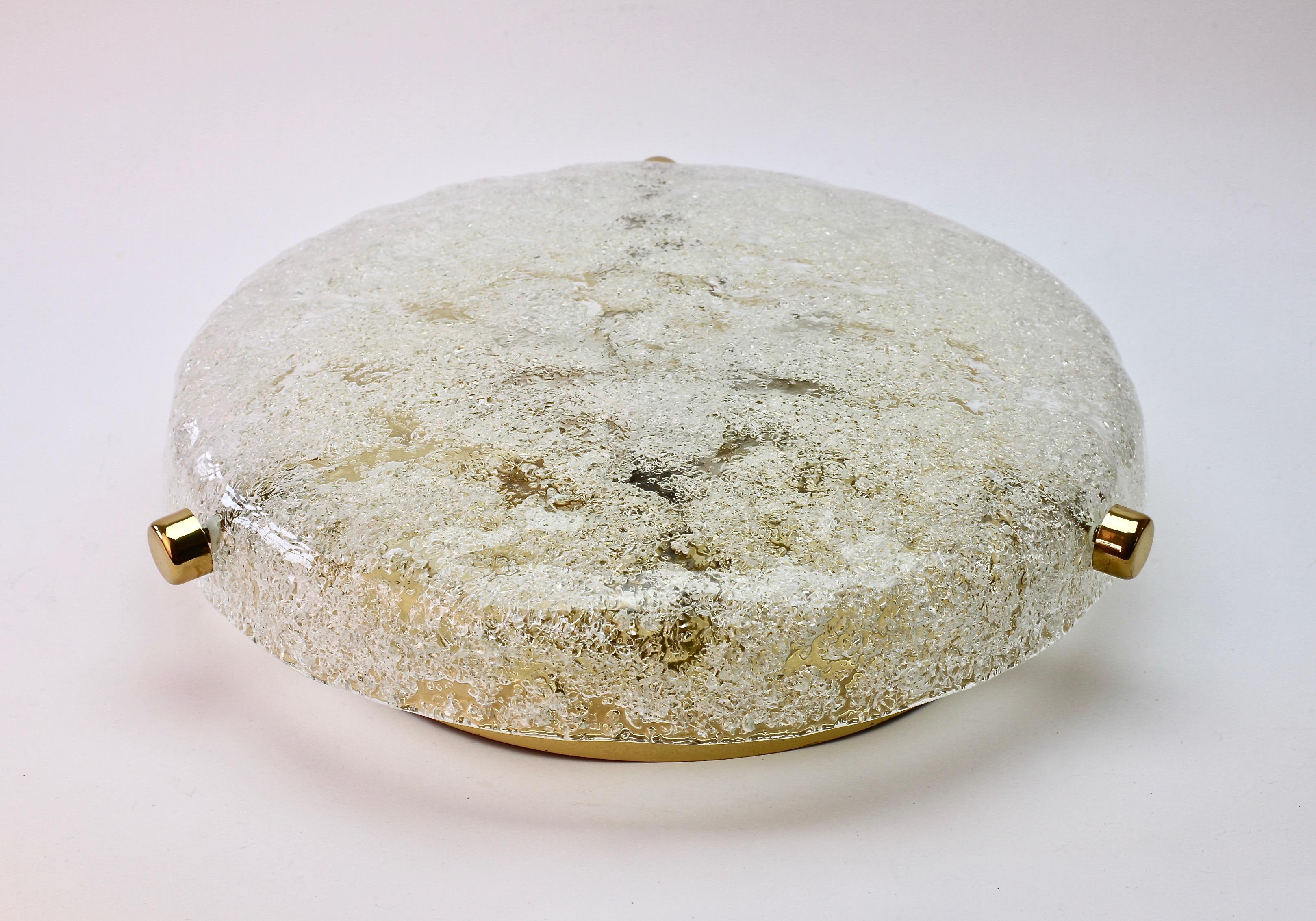Stunning Mid-Century Modern textured ice glass flush mount light fixture by German manufacturer Hillebrand, circa 1965.This vintage ceiling lamp, often mistakenly attributed to Kalmar, features a huge round glass dish is made of Italian 'Frit'