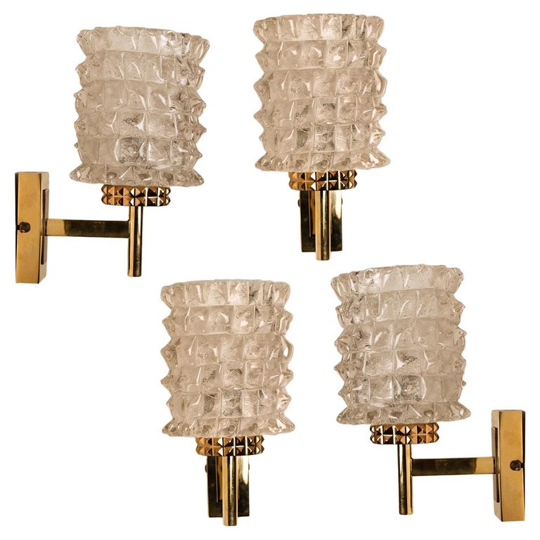 Clean lines to complement all decors. A wonderful high-end Hillebrand wall light fixture with brass details and thick textured glass.

The wall sconce holds 1 E14 socket max 40 Watt. Also LED compatible.
The size: Depth 5,9 