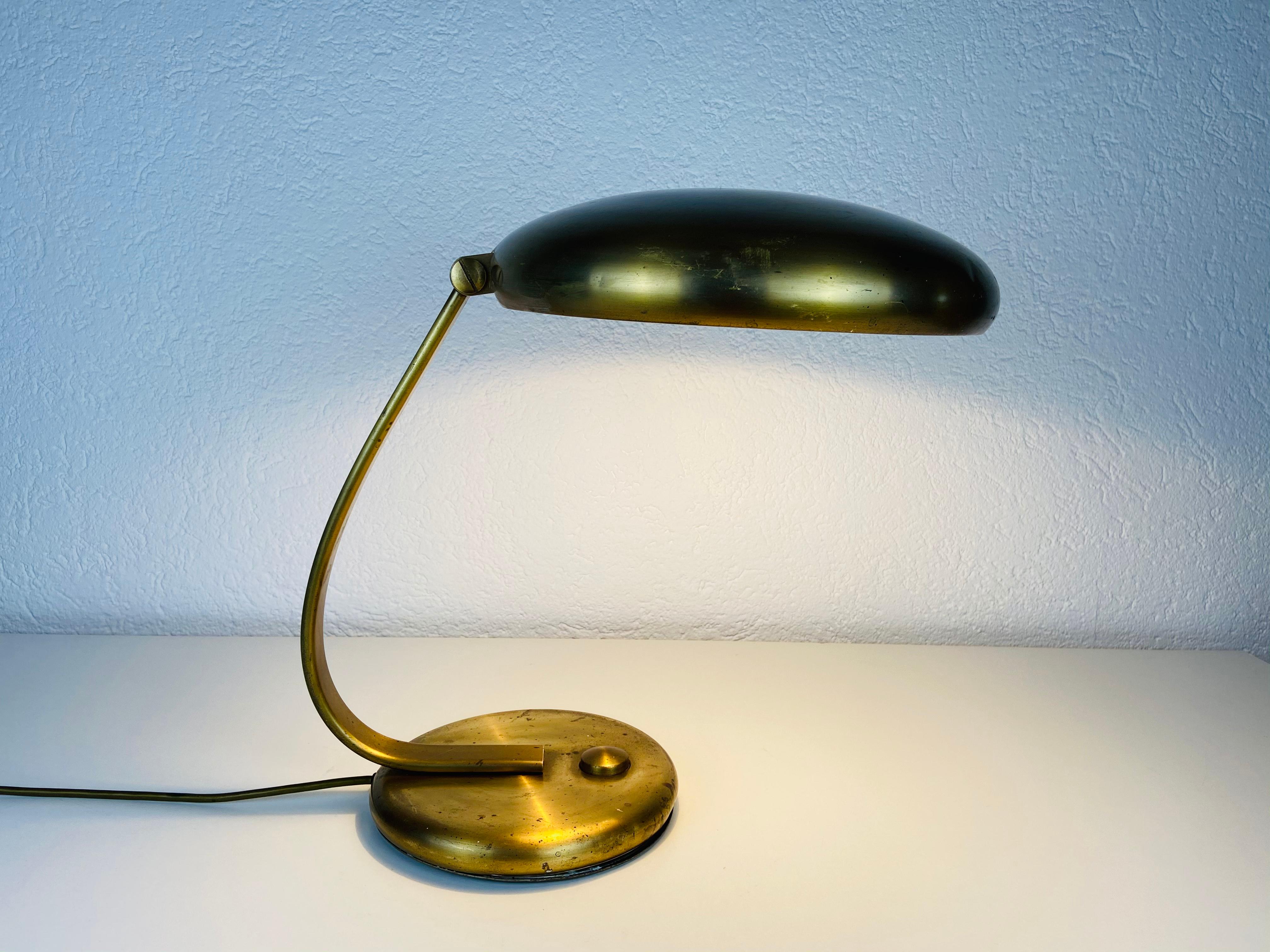 A Hillebrand table lamp made in Germany in the 1960s.

The light requires one E27 (US E26) light bulb. Works with both 220V/120V.

Free worldwide express shipping.