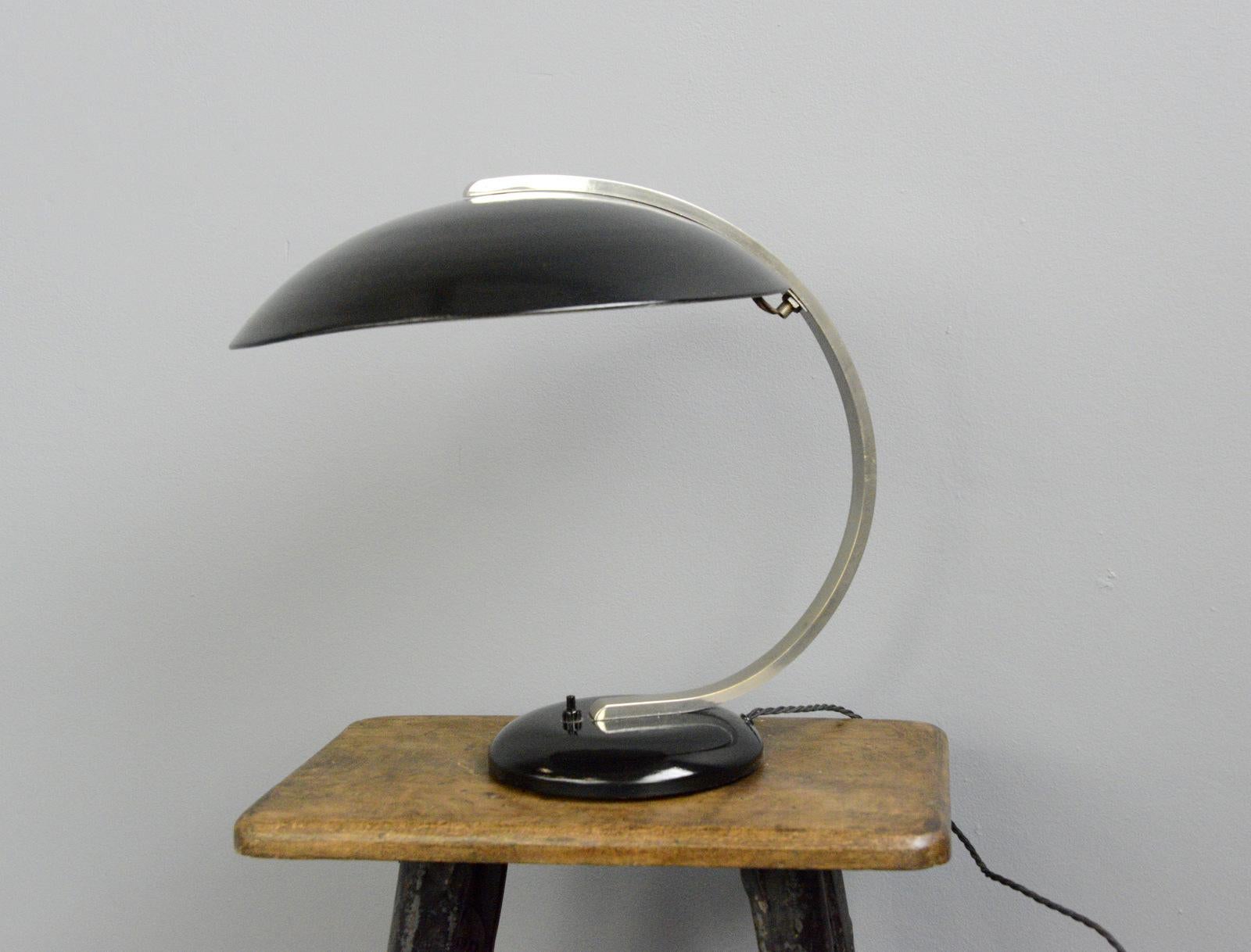 Hillebrand table lamp, circa 1930s.

- Chrome arm with black base and shade
- Takes E27 fitting bulbs
- On/Off switch on the base
- Branded on the base
- Original rubber feet
- Made by Hillebrand
- German ~ 1930s
- Measures: 43cm tall x