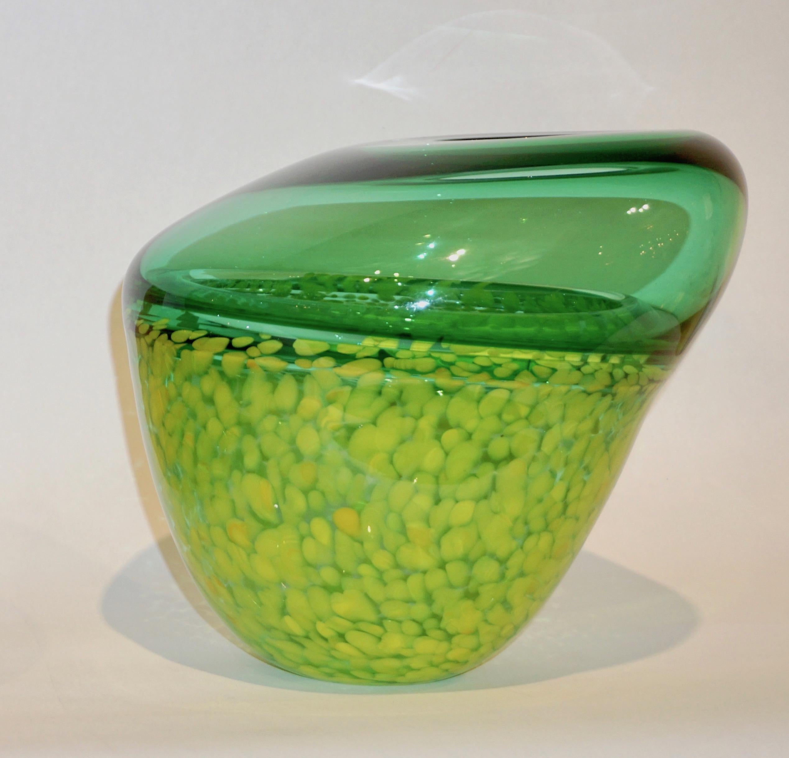 A one-of-a-kind organic modern art glass sculpture signed by Hilton McConnico, designed and blown in the 1990s, part of an exclusive collection of unique pieces designed for Formia, Murano.
This lime green and yellow vase is executed with the