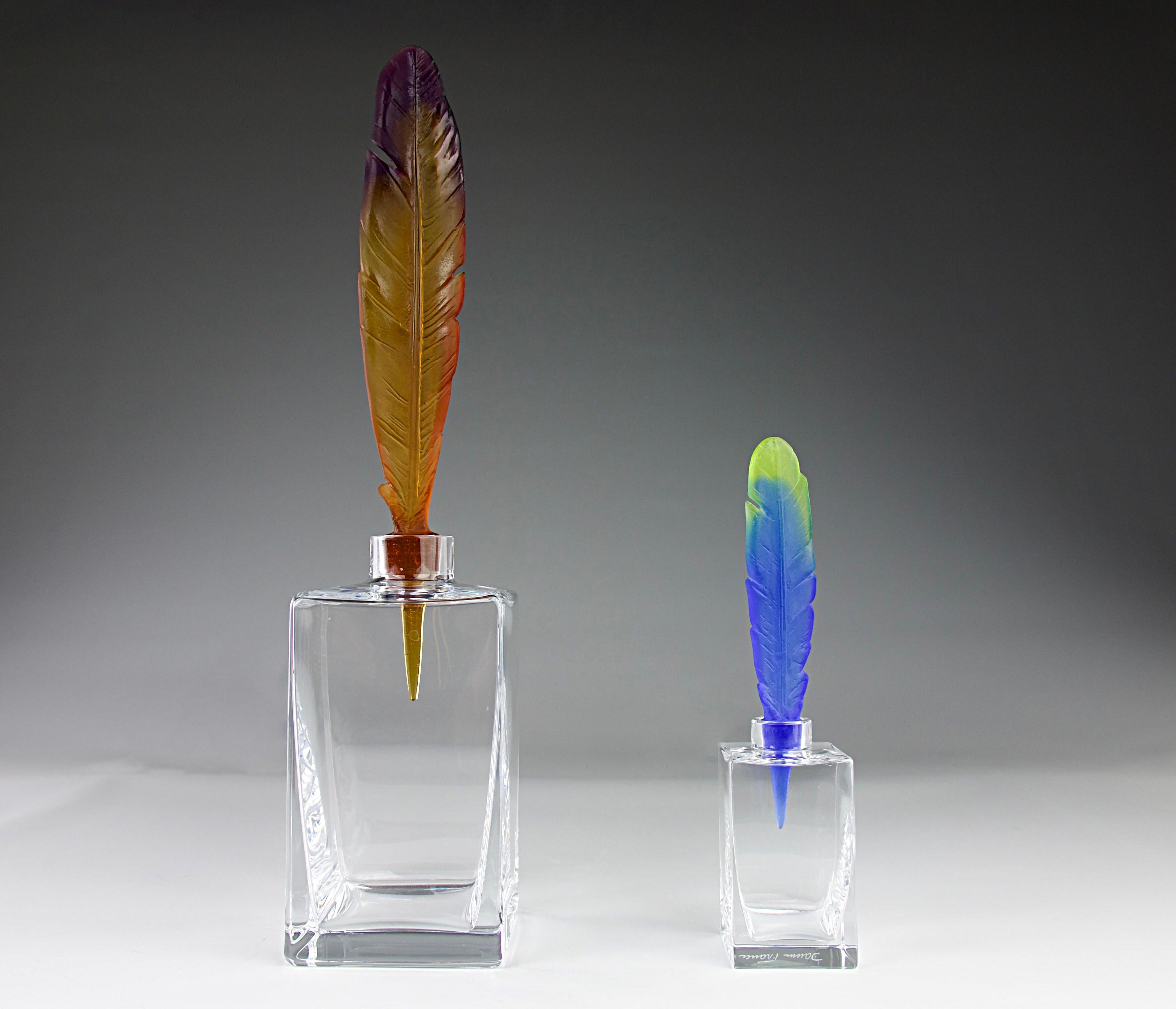 Superb 'Cheyenne' carafe service designed by Hilton McConnico for Daum. Stopper of the carafe in the shape of a feather quill. Blue model named Cheyenne Amethyst and brown model Cheyenne Amber.

In very good condition.

Dimensions in cm ( H x D )