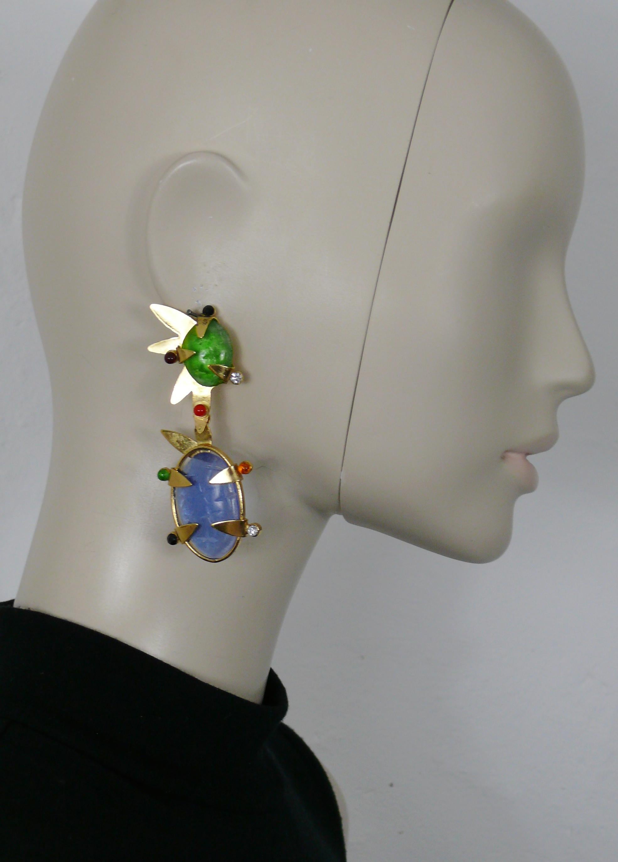 HILTON McCONNICO for DAUM vintage gold toned detachable dangling earrings (clip-on) featuring a spyke/burst design, green and blue pate de verre cabochons with carved X details, multicolor glass cabochons and crystals.

These dangling earrings are