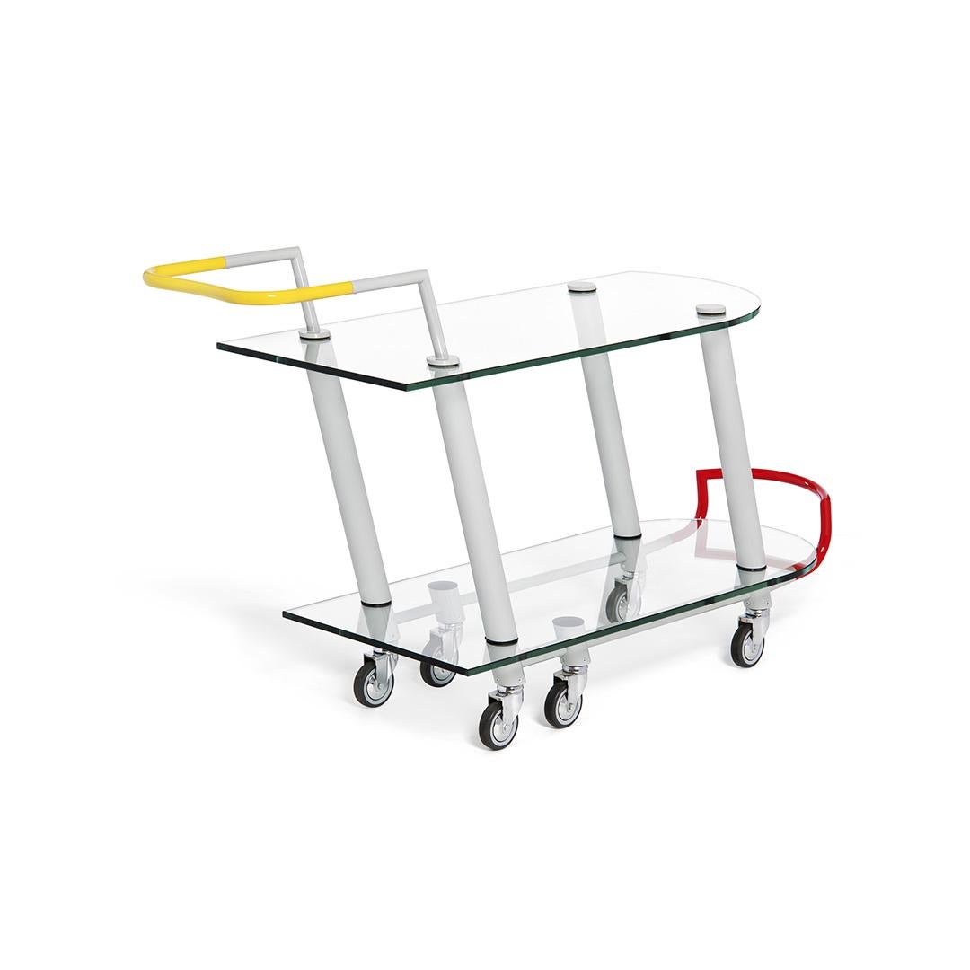 Hilton trolley in lacquered metal and crystal glass, designed in 1981 by Javier Mariscal. 

He was born in Valencia in 1950. In 1971 he moved to Barcelona to study Graphic Design at the Elisava School. There he came into contact with comic book