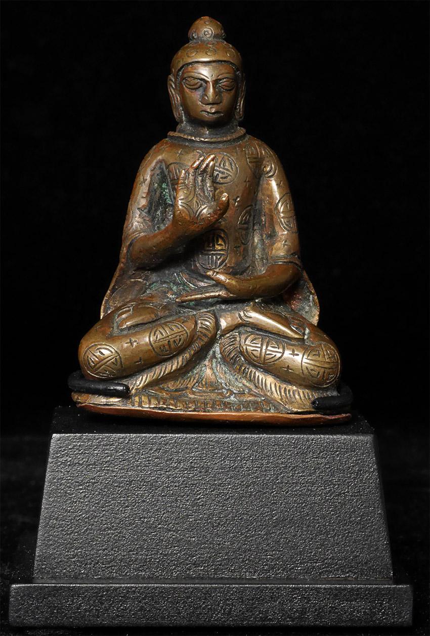 Unusual Himalayan Buddha. Early style with good Age- hard to date or place, but 19thC at least and from the Himalayan region. Sits 2 3/8 inches tall, 3.5 inches on custom stand. Beautiful original baseplate. One collector emailed that he believed