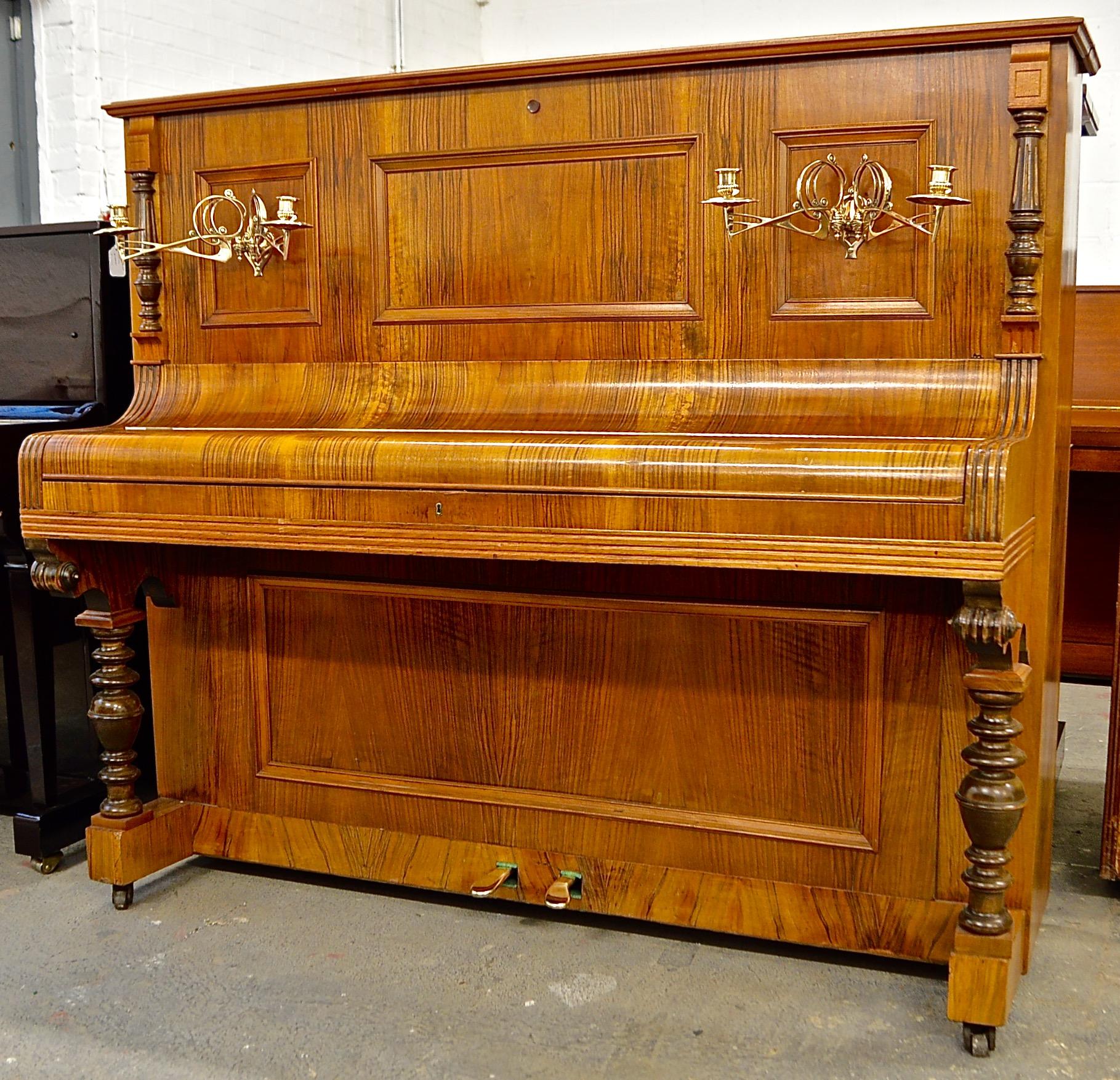 This is a very beautiful piano crafted by the German piano maker Himmel. The company was based in Berlin Germany, a region famous for piano making, this company embodied everything that is great in piano making - handcrafted tradition using the