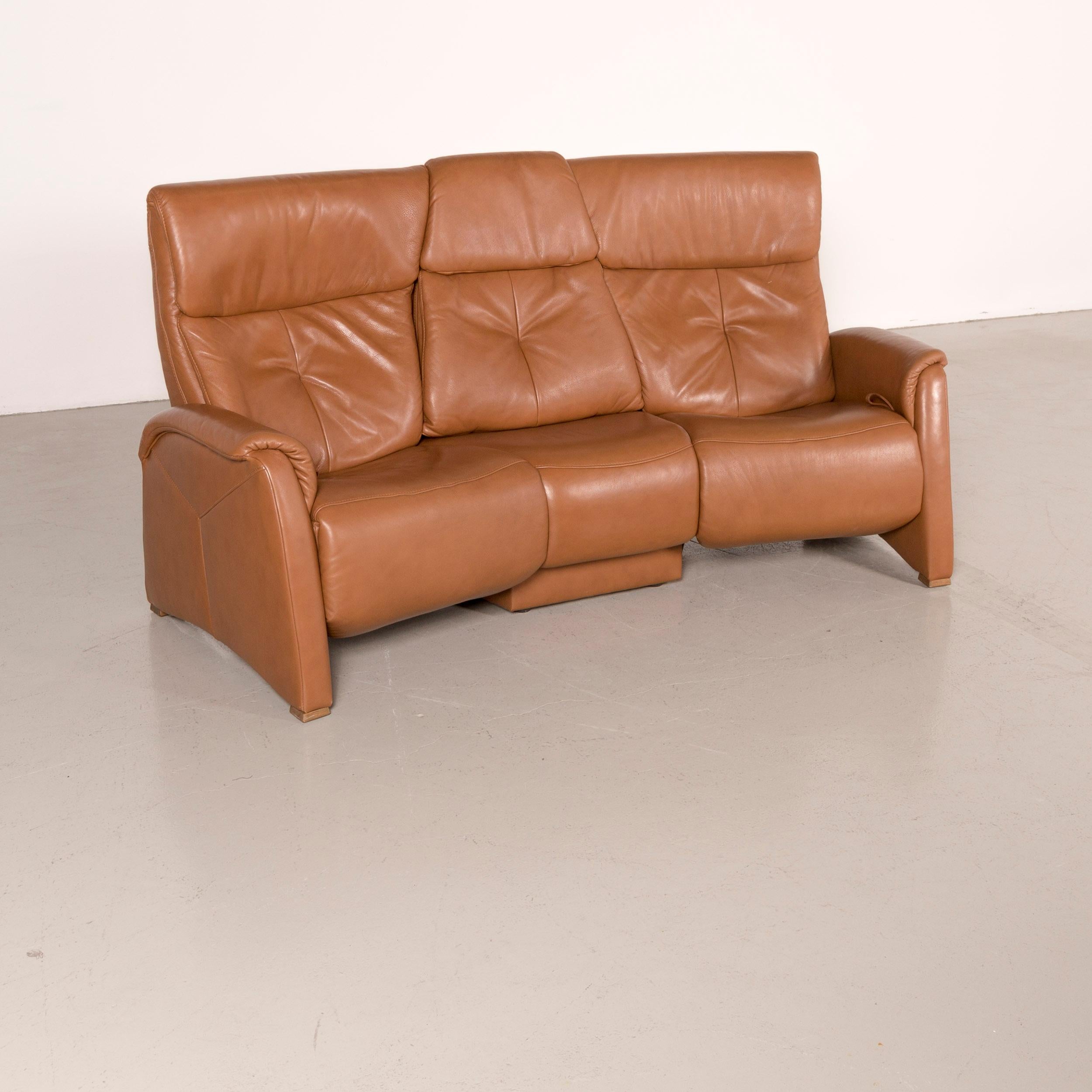 Himolla designer sofa brown leather three-seat couch recliner function.