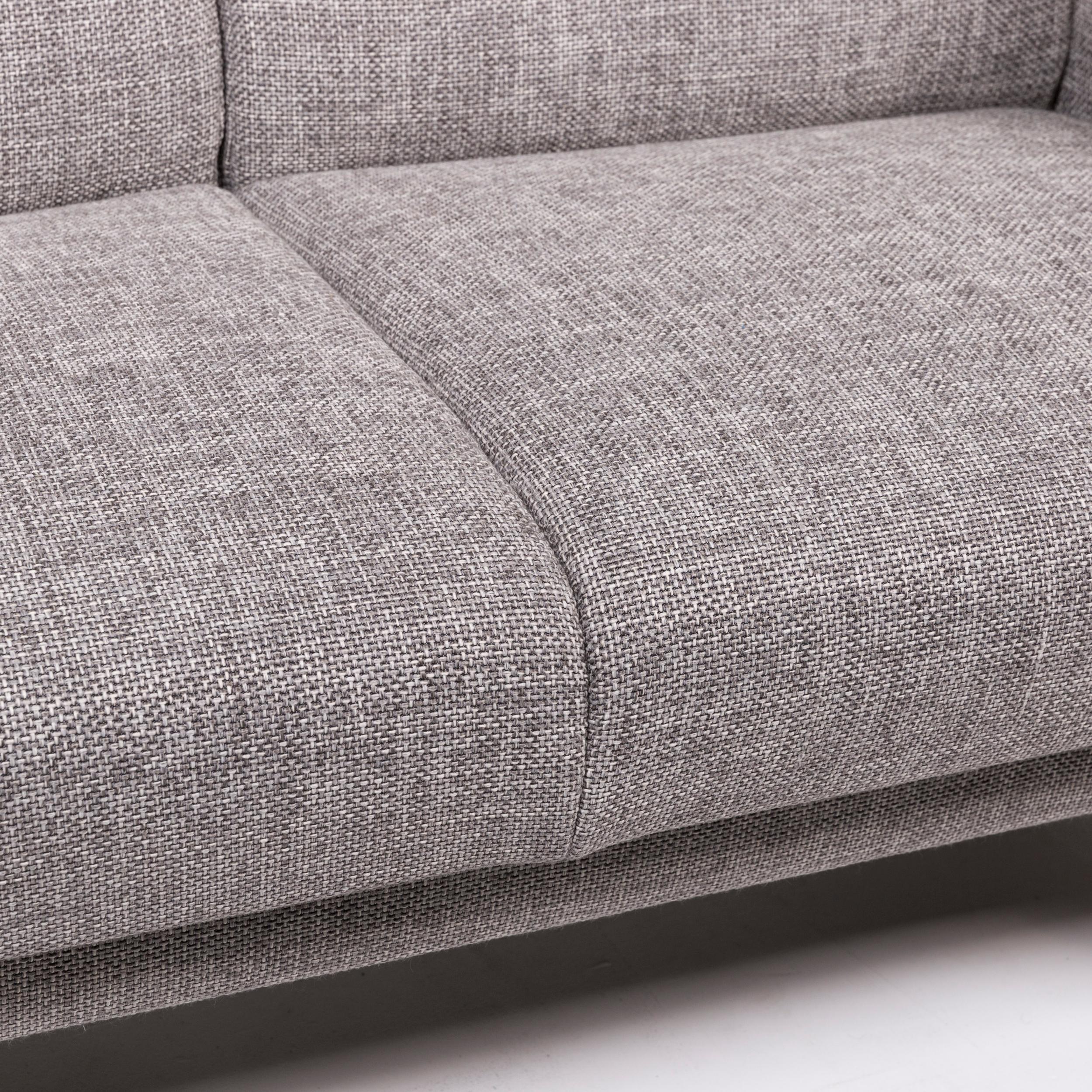 We present to you a Himolla fabric sofa gray two-seat couch.

 

 Product measurements in centimeters:
 

Depth 82
Width 128
Height 101
Seat height 47
Rest height 65
Seat depth 53
Seat width 107
Back height 55.
   