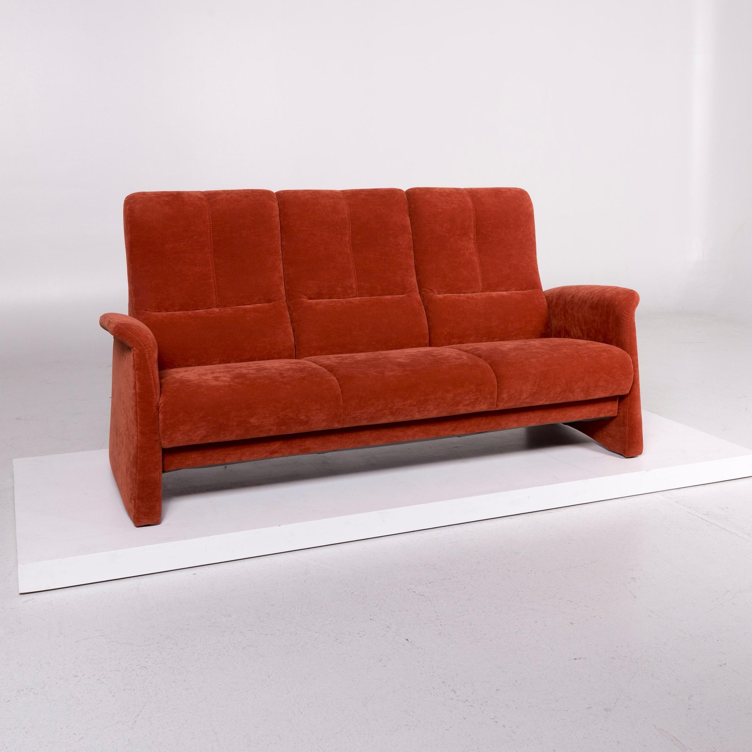 We bring to you a Himolla fabric sofa orange rust red three-seat couch.
   
 

 Product measurements in centimeters:
 

 Depth 83
Width 184
Height 95
Seat-height 42
Rest-height 59
Seat-depth 52
Seat-width 158
Back-height 56.