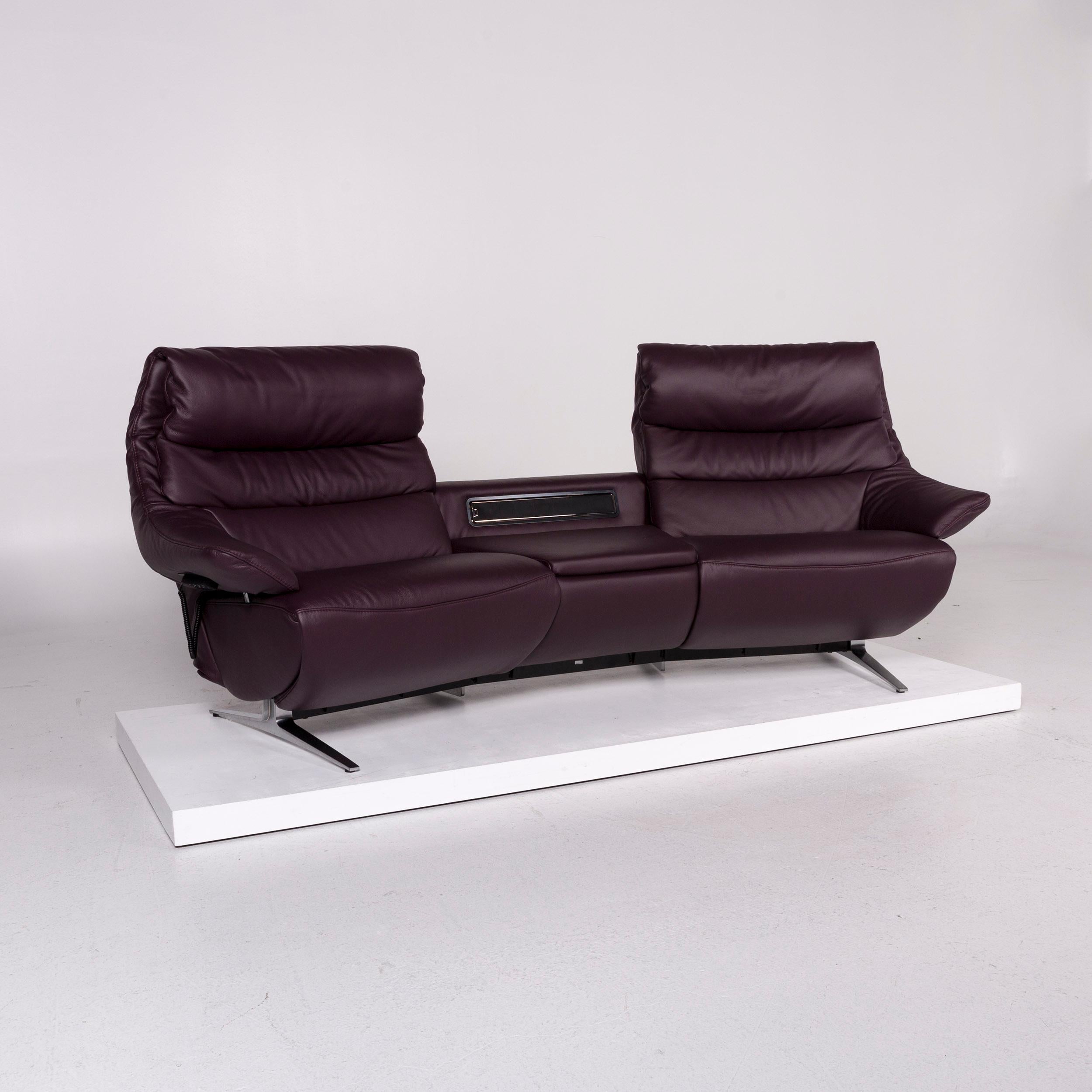 We bring to you a Himolla leather sofa eggplant purple relax function electrical function couch.


 Product measurements in centimeters:
 

Depth 103
Width 253
Height 101
Seat-height 48
Rest-height 58
Seat-depth 49
Seat-width