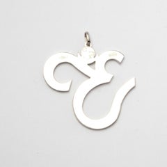Hindu symbol pendant in gold and diamonds