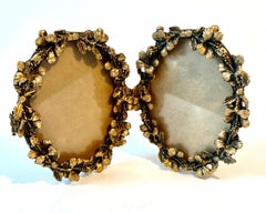 Hinged Double Oval Gilt Metal Picture Frames with Leaves
