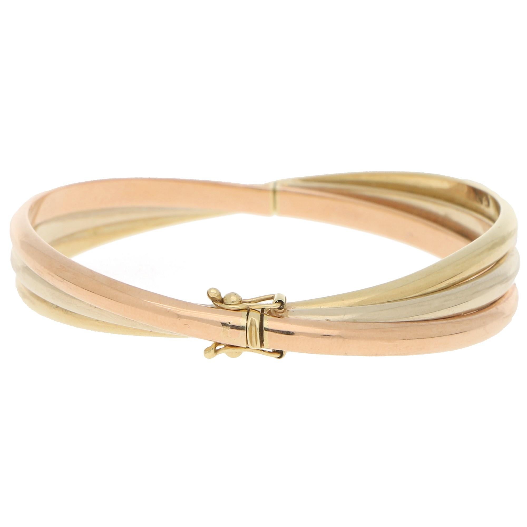 Hinged Trinity Bangle Set in 9 Karat Yellow, White and Rose Gold In Good Condition In London, GB