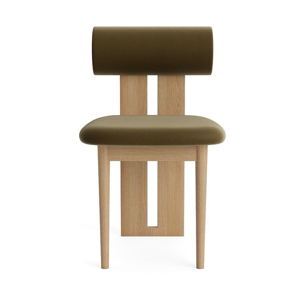Hippo chair.
Signed by Kristian Sofus Hansen and Tommy Hyldahl for Norr11. 

Model shown on the picture:
Wood: natural oak.
Fabric: brussels velvet olive green 751.

Wood types available: natural oak / light smoked oak / dark smoked oak /