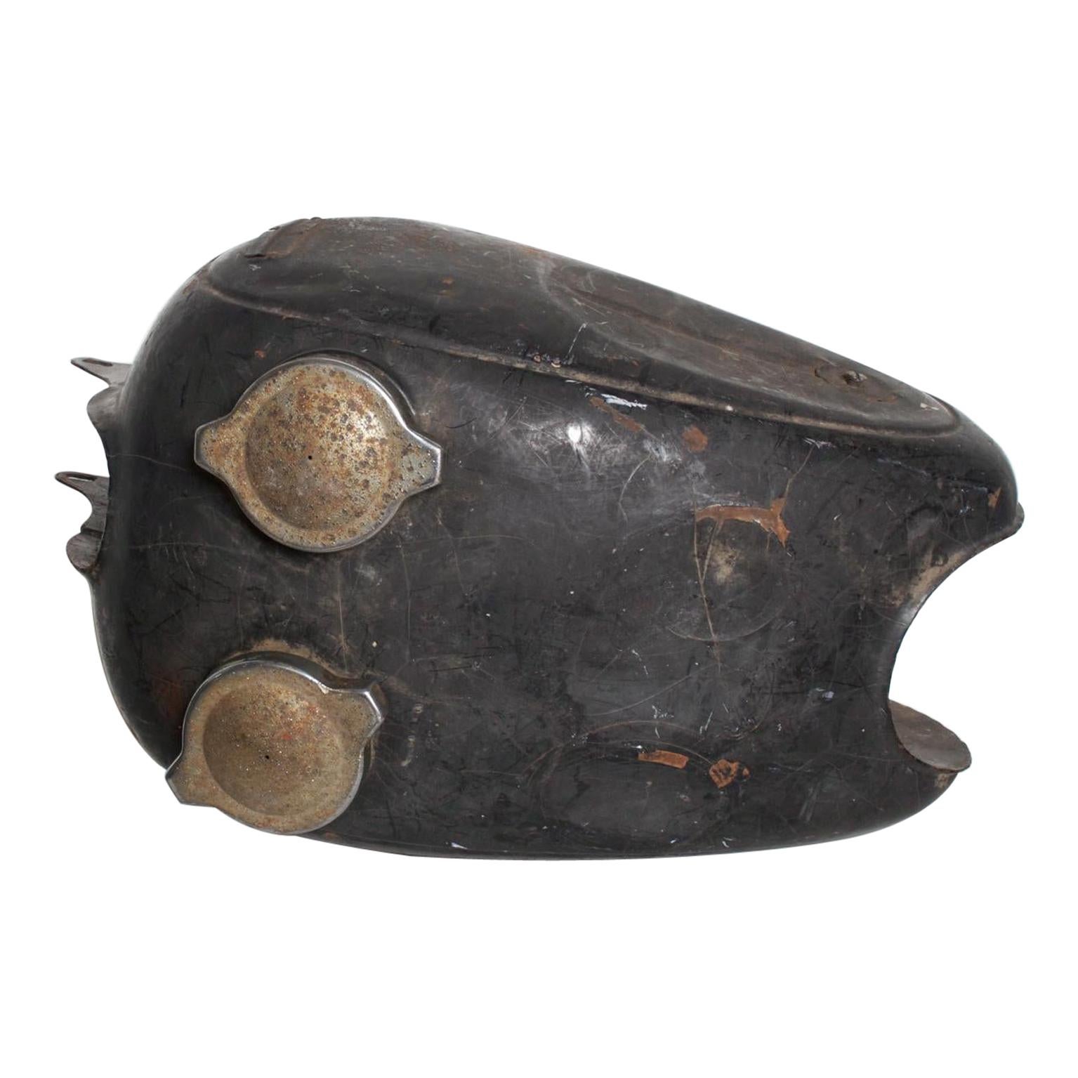 Gas Tank
Distressed Vintage Mod Motorcycle Gas Tank Black Metal Made in the USA 1960s
Has seen a lot of use and wear--weathered and worn living
Unmarked.
Fun for man cave. Great display piece. Mod appeal.
Original Unrestored Distressed