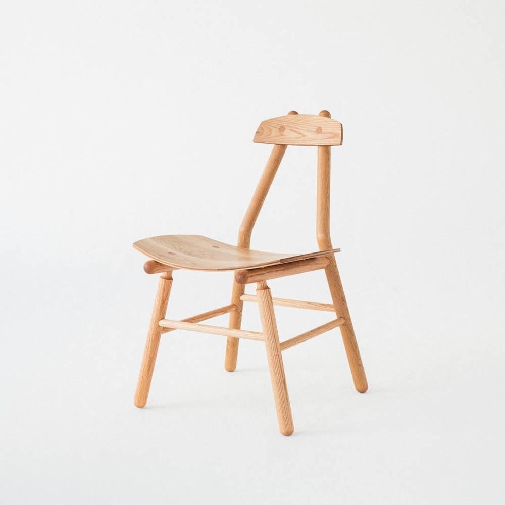 The Hiro chair is a contemporary, minimalist design made with traditional methods and solid wood joinery. The seat and back are fabricated from specially milled hardwood with a custom pressed curve that hugs the user. Its light and strong frame was