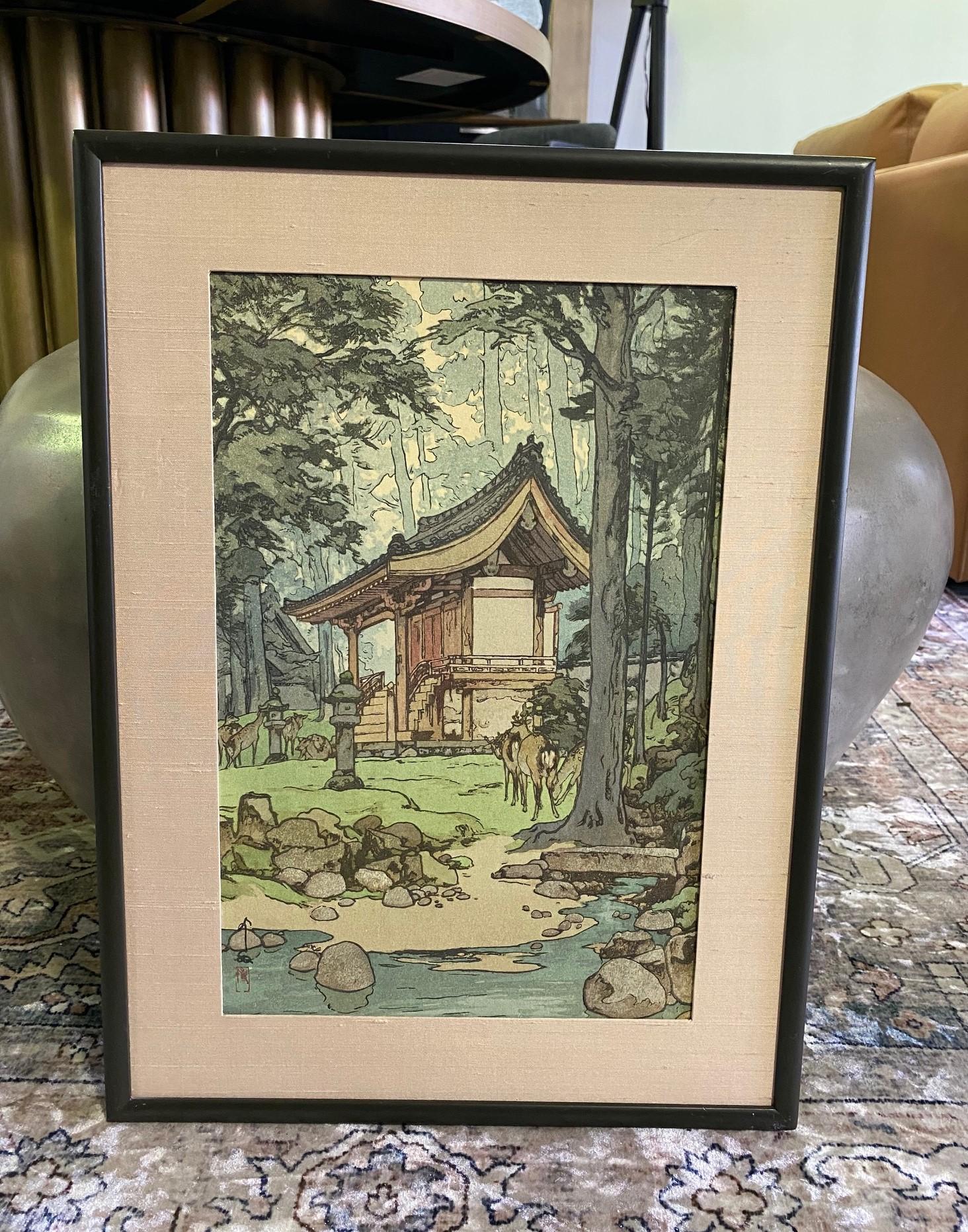 This wonderful image of a Japanese temple deep in a luscious, green forest with playful deer is titled 
