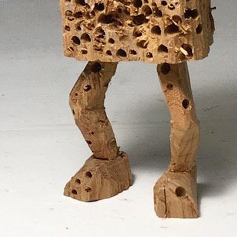 Based in Kanagawa Japan, Hirosuke Yabe creates wooden sculptures using a nata, a Japanese
hatchet. With quick, short chops, Yabe conjures a menagerie of human expressions. Ranging in
size from just a few inches to several feet high, he stacks faces