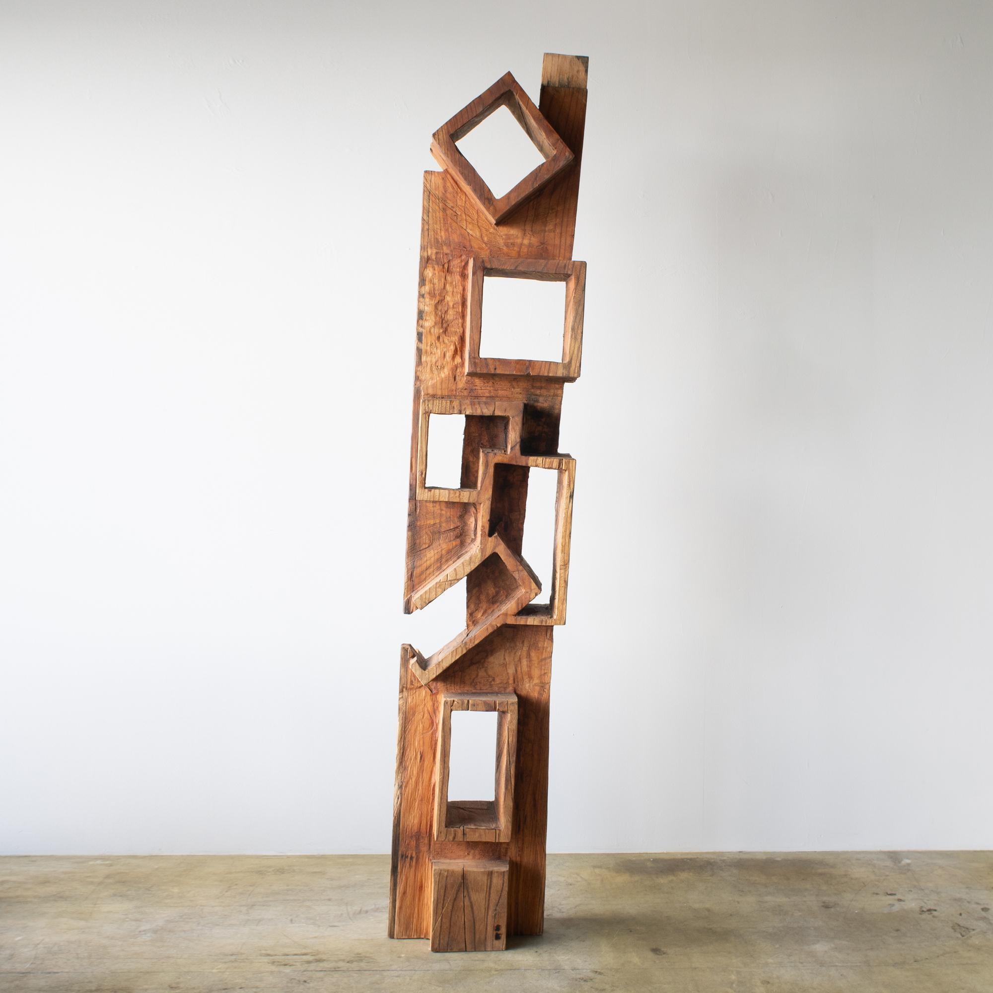 Masouleh Tower 3
Sculpture. Also it can be used as small bookcase. 

Material: Zelkova
This work is carved from log with some kinds of chainsaws.
Most of wood used for his works are unable to use anything, these woods are unsuitable material for