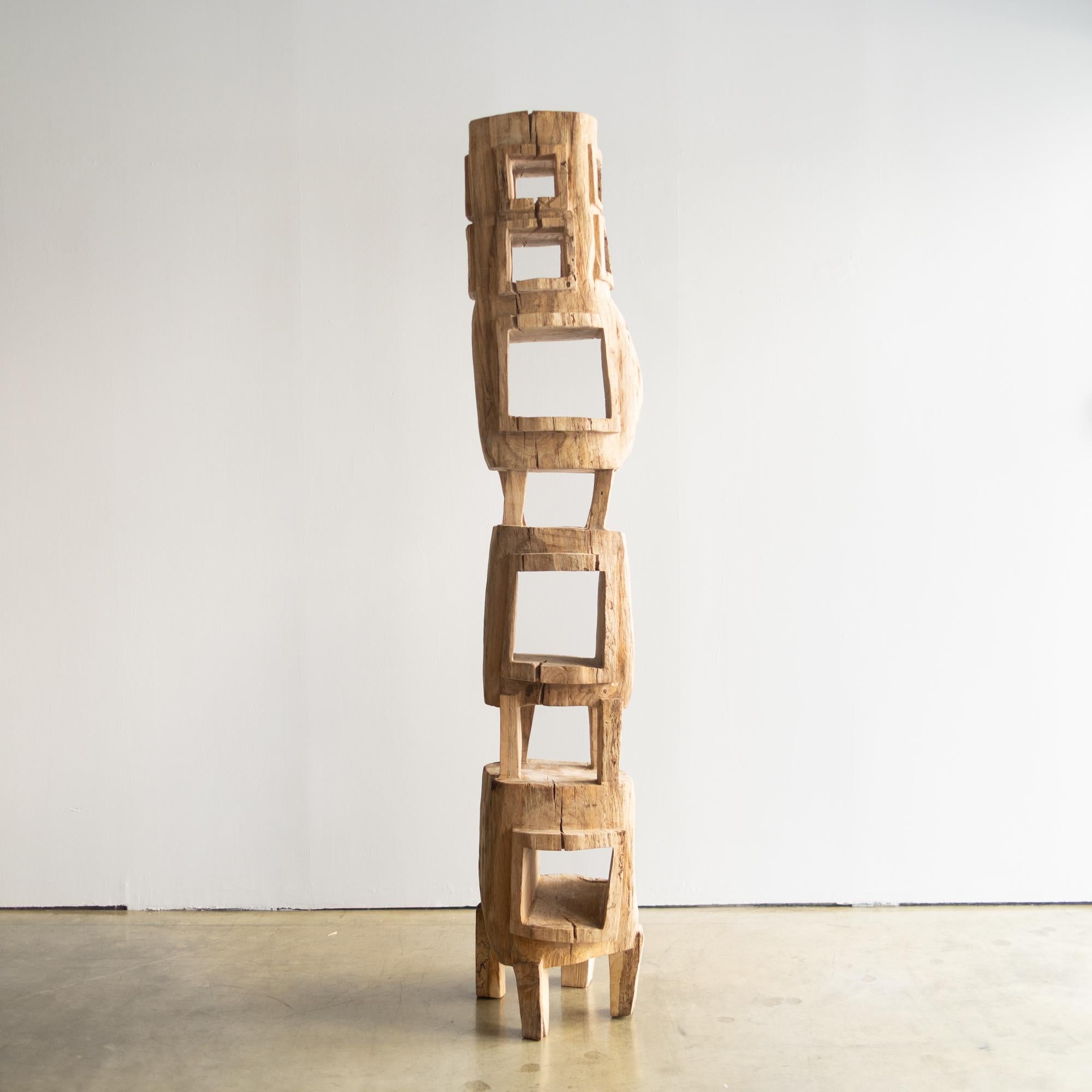 Monitor Tower 
Sculpture. Also it can be used as small bookcase. 

Material: white oak
This work is carved from log with some kinds of chainsaws.
Most of wood used for his works are unable to use anything, these woods are unsuitable material for