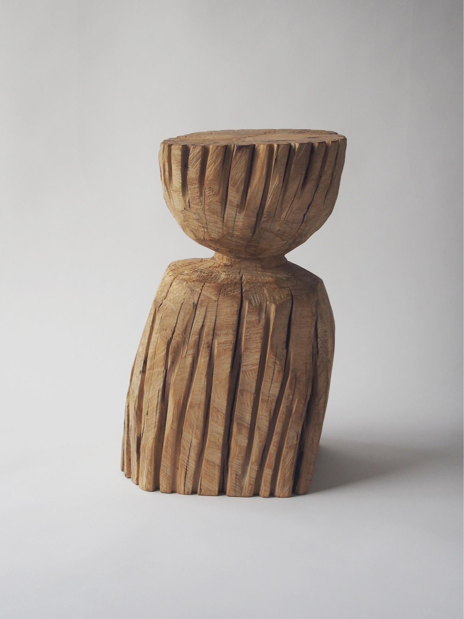 Name: Boy
Sculptural stool by Zougei carved furniture
Material: Zelkova
This work is carved from log with some kinds of chainsaws.
Most of wood used for Nishimura's works are unable to use anything, these woods are unsuitable material for furniture,