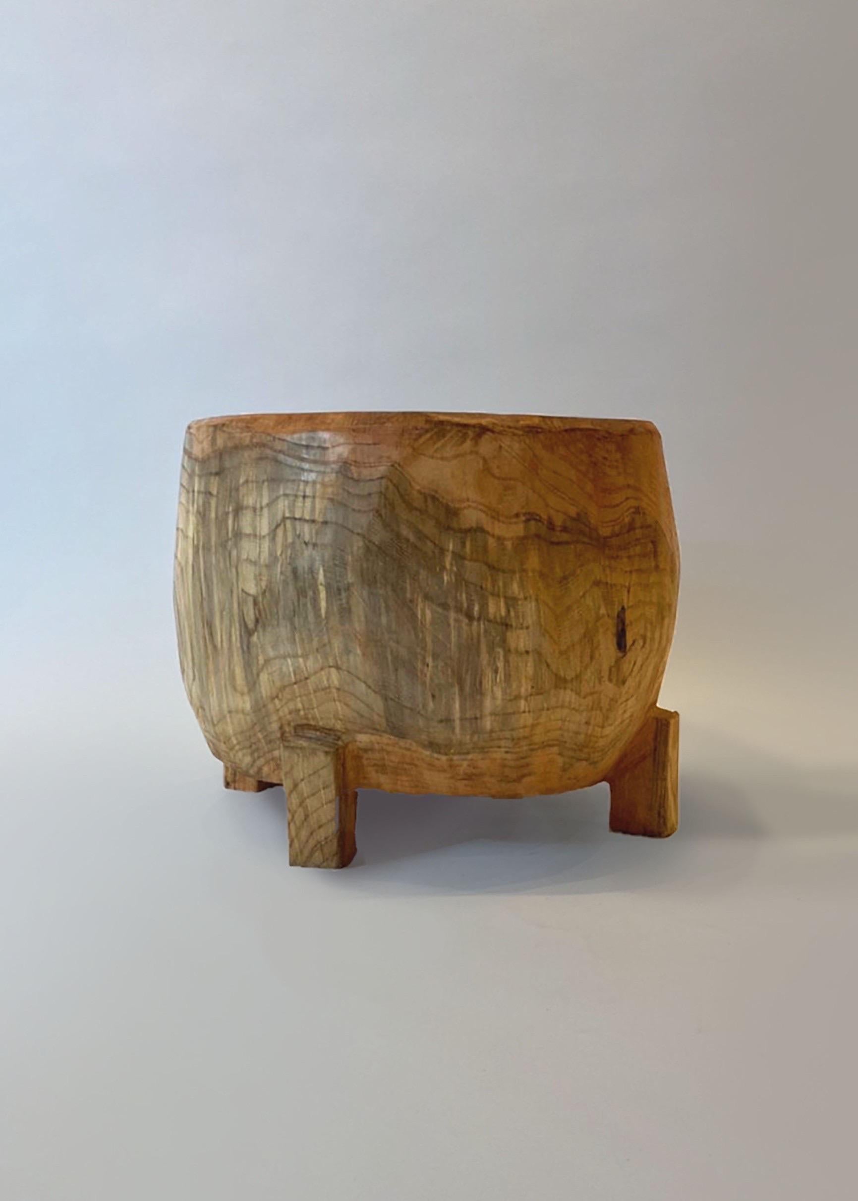 Name: Daifuku
Sculptural stool by Zogei carved furniture
Material: Zelkova
This work is carved from log with some kinds of chainsaws.
Most of wood used for Nishimura's works are unable to use anything, these woods are unsuitable material for