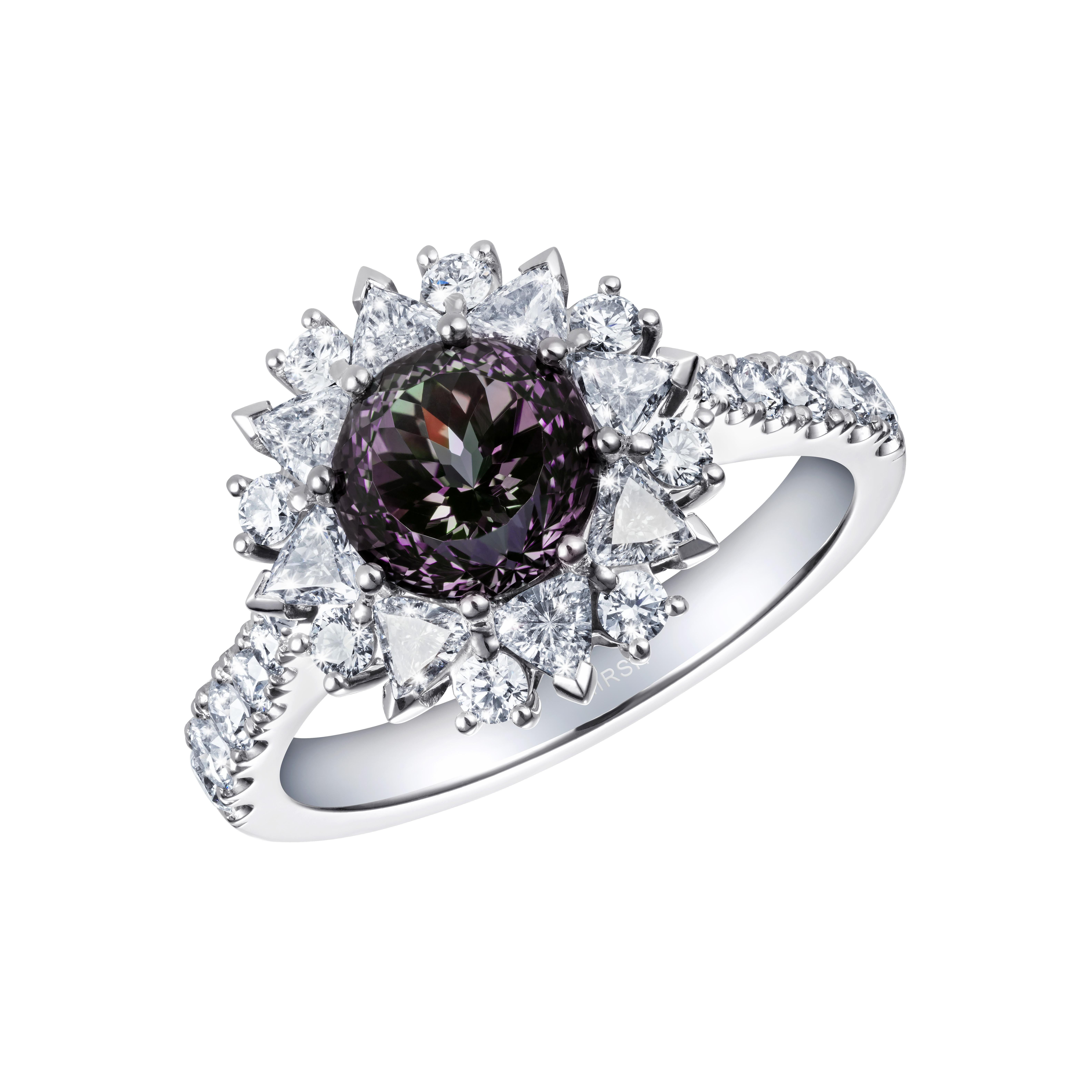 An extremely rare colour-change natural Alexandrite, surrounded by 46 white diamonds. The Alexandrite changes from deep purple in incandescent light to green in daylight.

- 1.92 carat natural Alexandrite with gemological certificate
- 46 diamonds