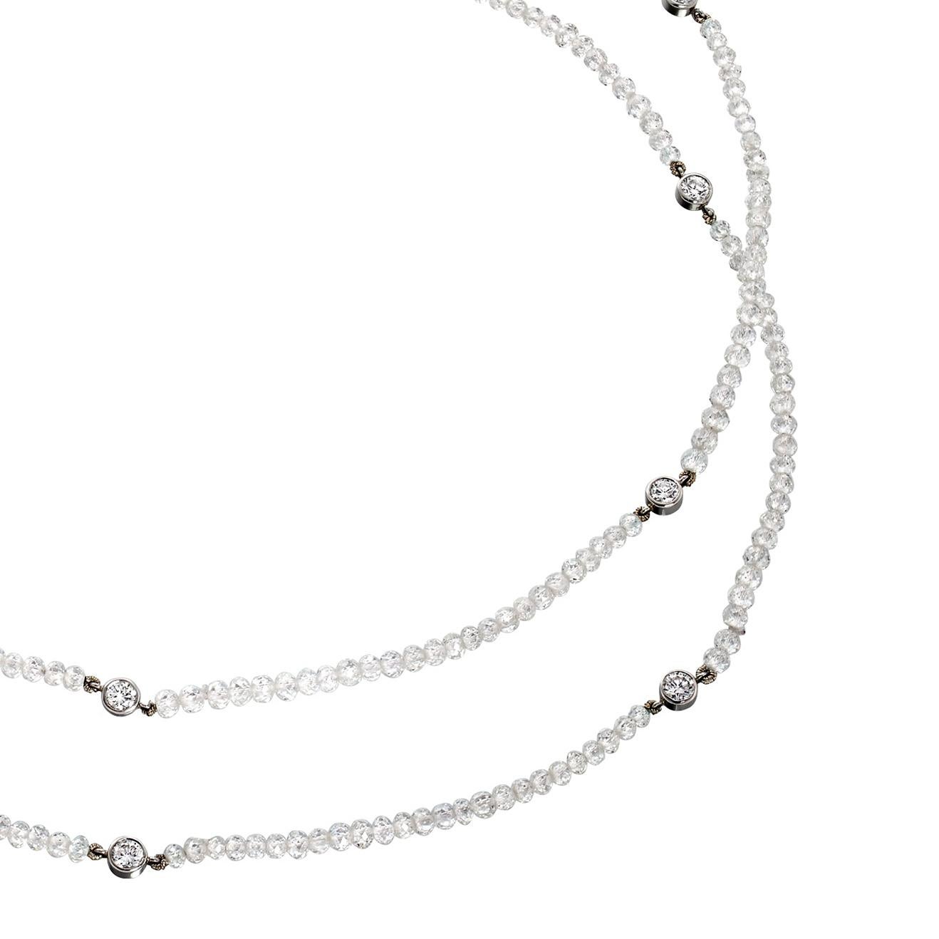 A beautiful Art Deco briolette diamond necklace interspersed with rondel's of brilliant cut diamonds and a diamond set clasp.

- 275 briolette diamond beads weighing 39.36 carats
- 80 round diamonds totalling approx 1.87 carats
- Unique handmade