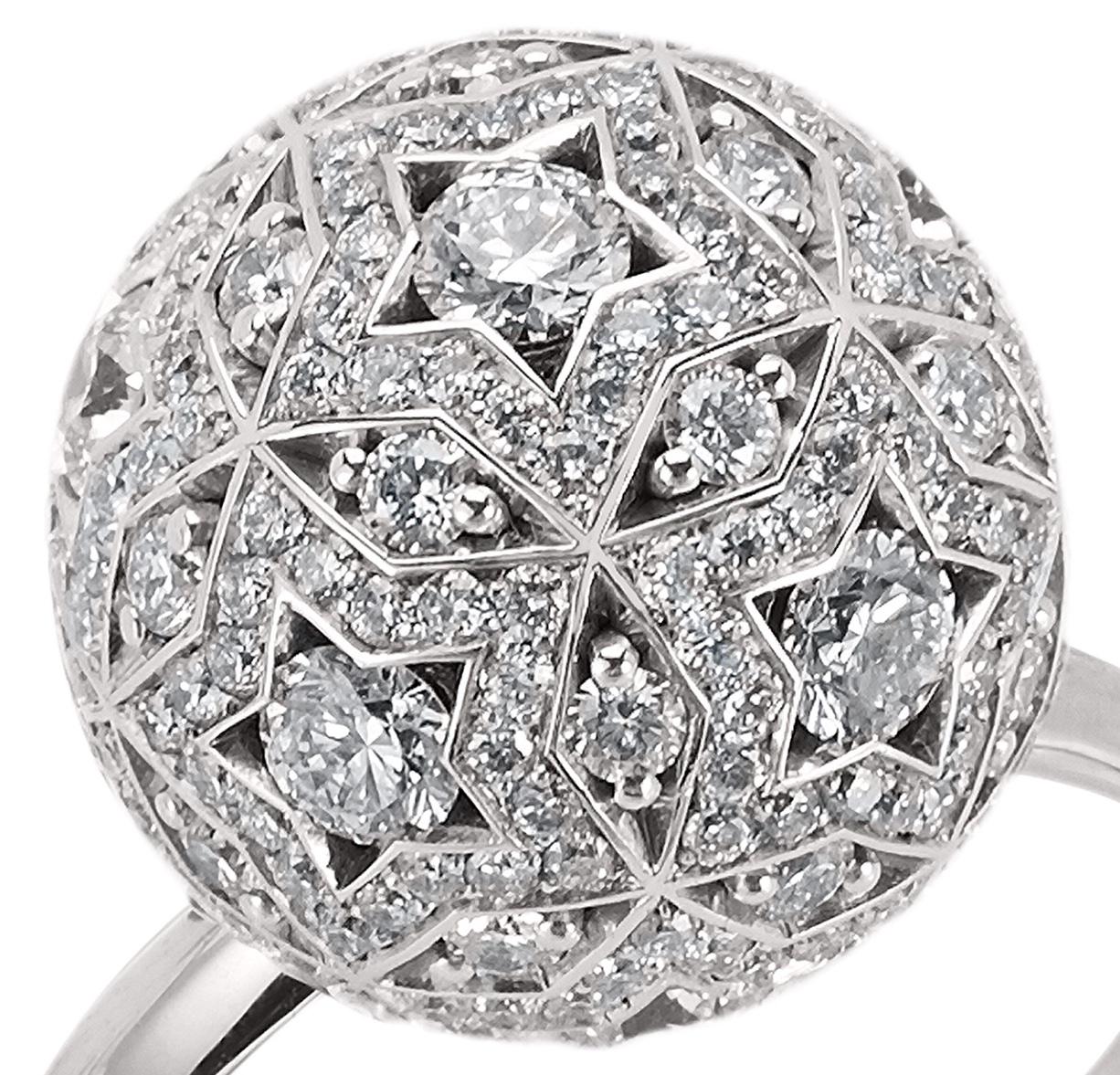 A unique ring design inspired by the constellations of the night sky and created with Hirsh Celestial Movement.

- 256 round cut diamonds weighing approx. 2.15 carat in total
- Created in 18K white gold with 28 hidden ruby jewel spheres

This