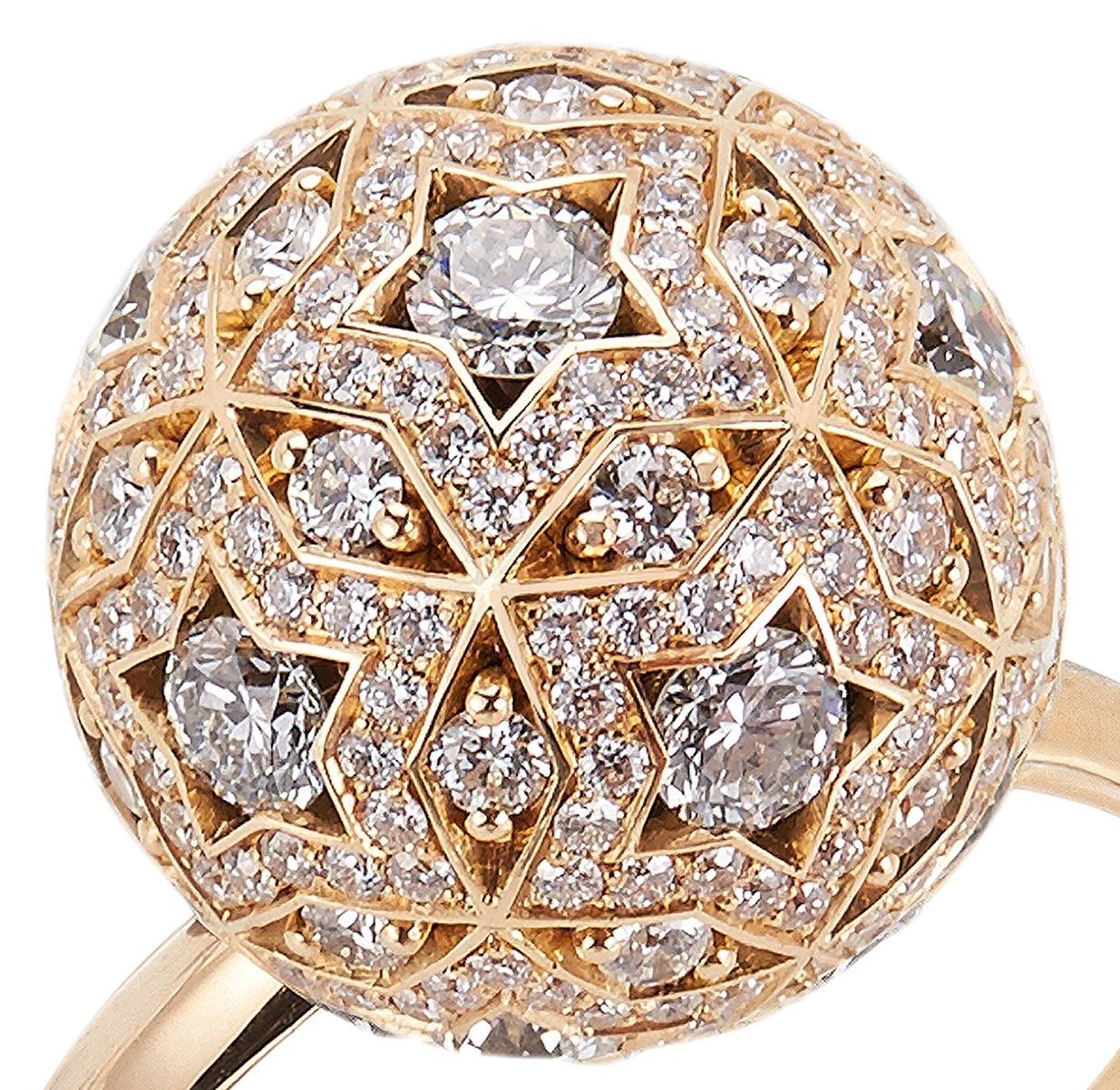 A unique ring design inspired by the constellations of the night sky and created with Hirsh Celestial Movement.

- 256 round cut diamonds weighing approx. 2.15 carat in total
- Created in 18K yellow gold with 28 hidden ruby jewel spheres

This