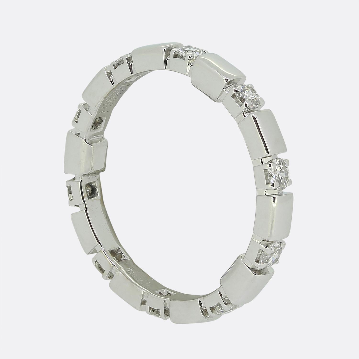 Here we have a beautiful signature eternity ring from Hirsh London. This sleek and stylish piece has been crafted from 18ct white gold and showcases an alternating array of individually claw set round brilliant cut diamonds; each of which is