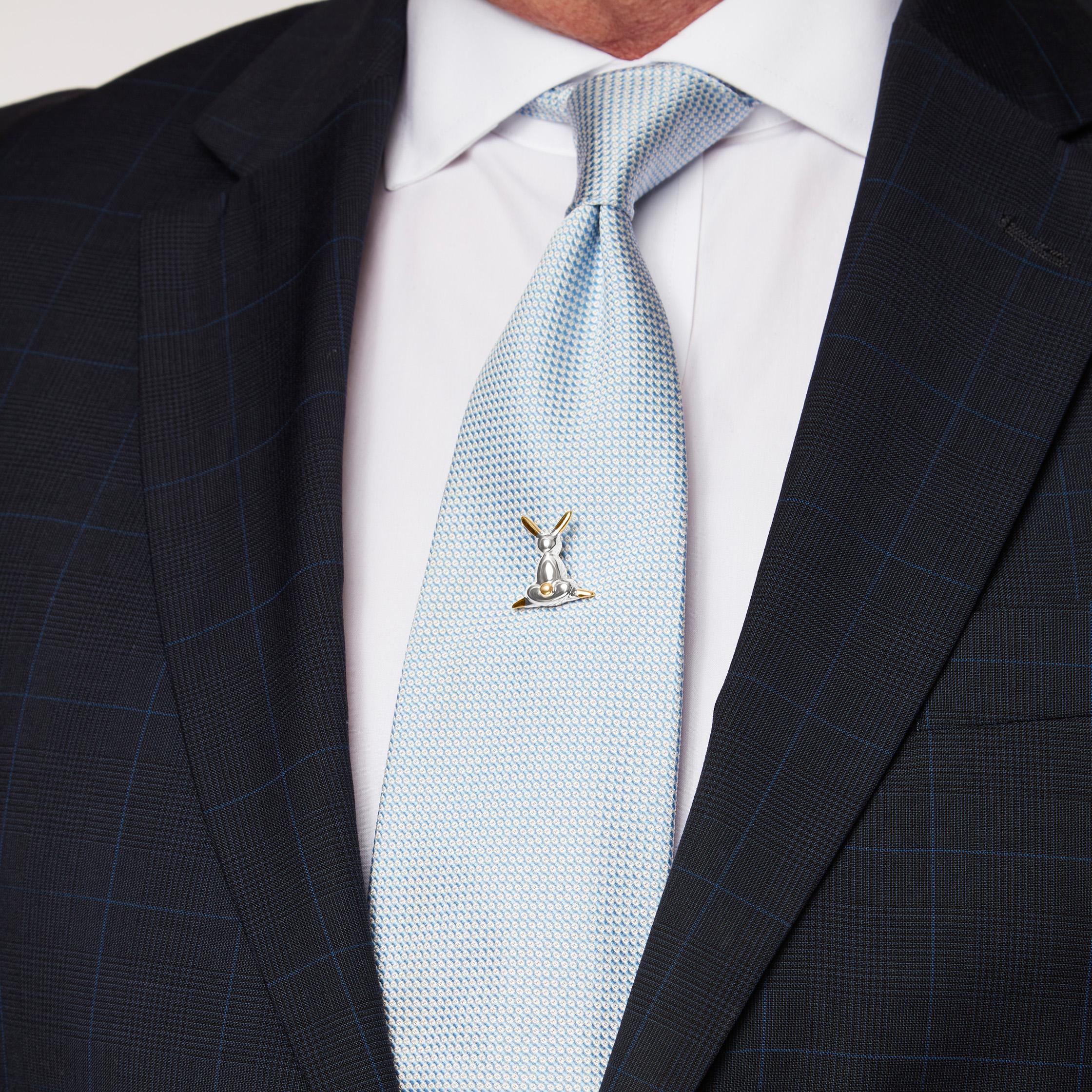 A unique Lucky Rabbit tie pin, handmade in 18K yellow gold and platinum.

Throughout history, rabbits have been regarded as a symbol of prosperity, longevity, peace and compassion. They are a beautiful reminder of new beginnings, springtime, hope