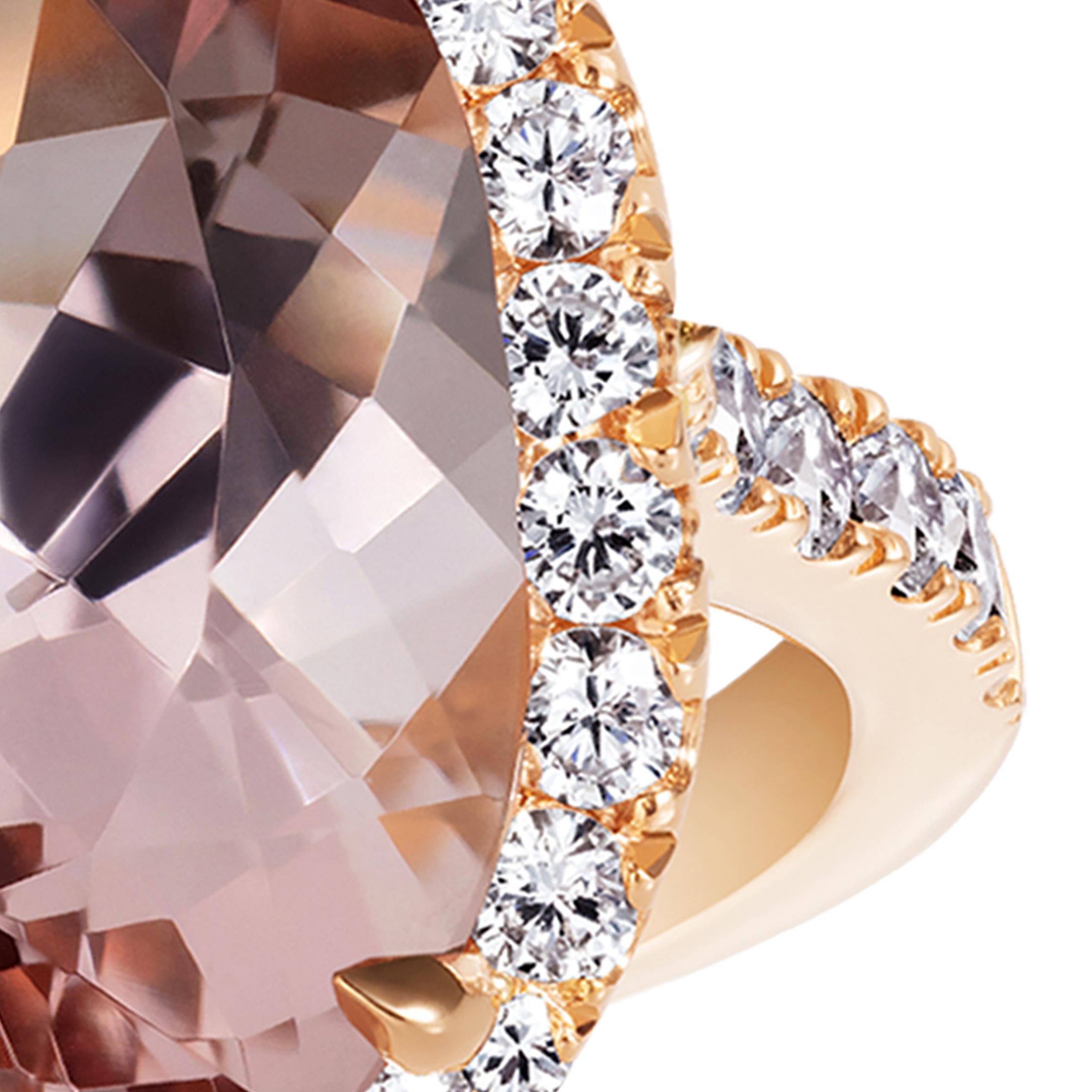 A beautiful 4 carat oval Morganite surrounded by diamonds. Set in the Hirsh 18K rose gold Regal setting.

- 4.02 carat oval Morganite
- Brilliant cut diamonds totalling approx. 0.64 carats
- Created in 18K rose gold, handmade in London

This ring is