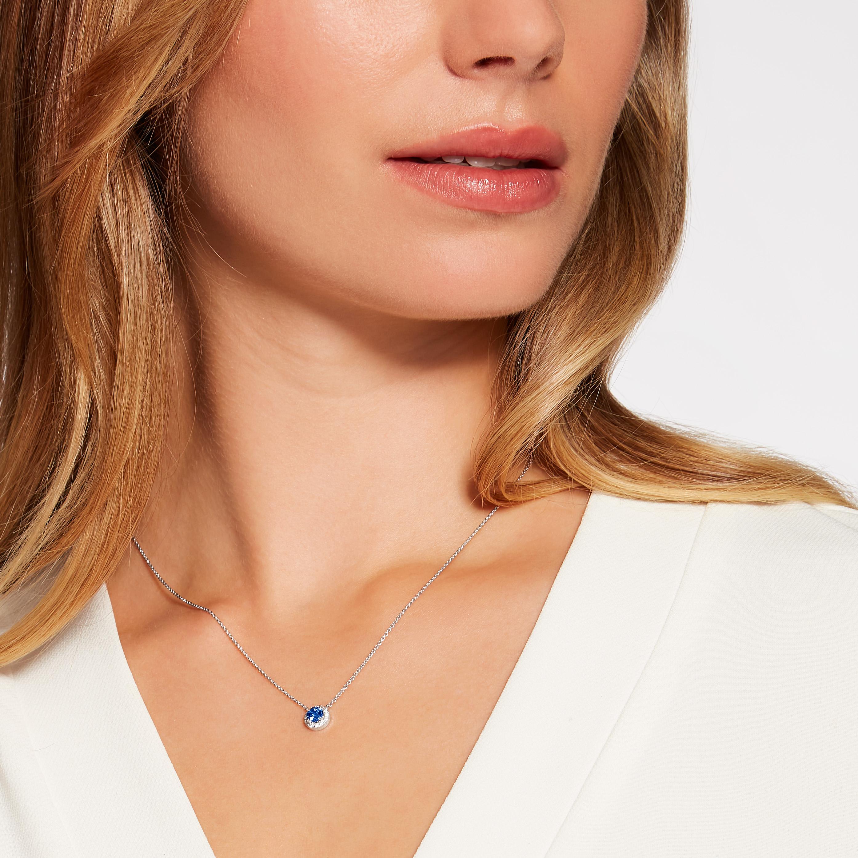 A mesmerising tanzanite of the prettiest colour, surrounded by diamonds in the Hirsh Regal setting. A perfect everyday pendant to take you from day to night.

- 1 round tanzanite weighing approx. 0.55 carats
- 12 brilliant cut diamonds weighing