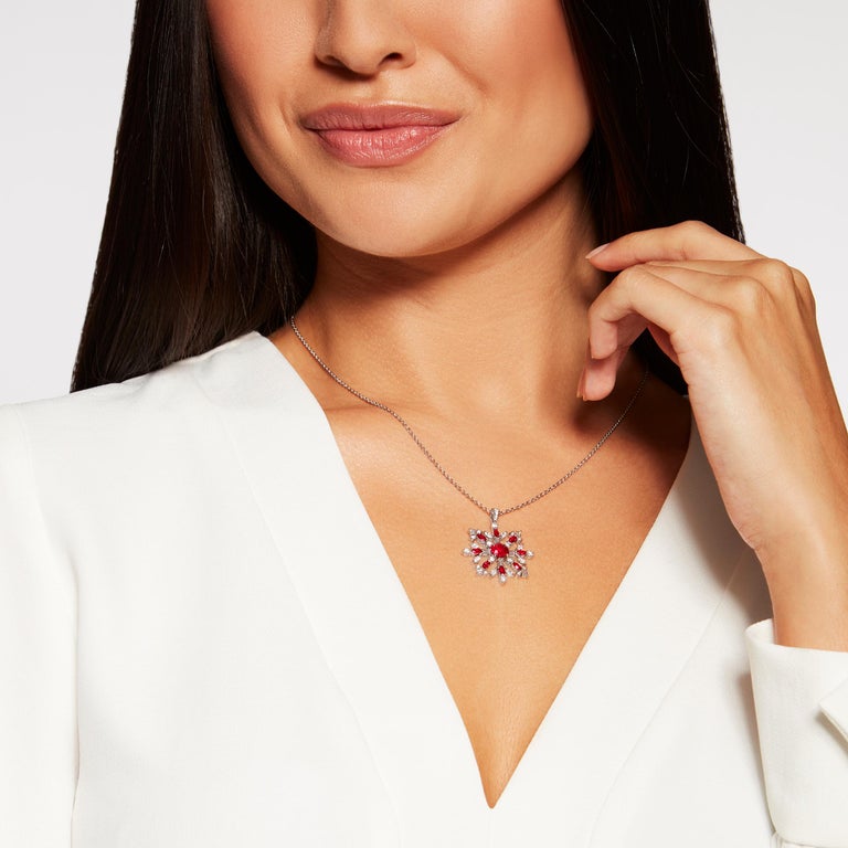 A unique and very special ruby and diamond Snowflake pendant. Just as snowflakes in nature are unique, so too are the Snowflake pendants we create at Hirsh. Each design is always different as are the gemstones we use. This beautiful pendant took 82
