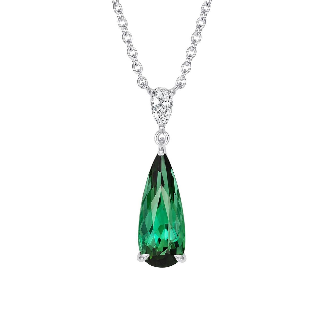 A beautiful pear shape green tourmaline set below a pear shape diamond in the unique Hirsh Wallace setting.

- 2.60 carat pear shape green tourmaline
- 0.16 carat pear shape diamond
- Created in platinum, handmade in London

Formed deep within the