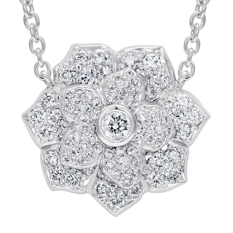 Roses are a timeless and enchanting flower that have been treasured throughout history and are still regarded as a symbol of romance, love, beauty and courage.

The Hirsh Wildflower Rose pendant is created by hand in platinum and set with sparkling