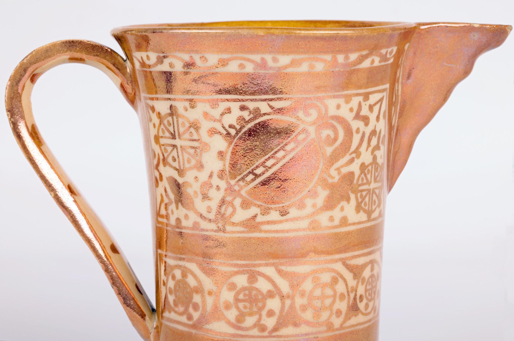 A very stylish Hispano-Moresque or Moorish influence copper lustre glazed art pottery jug dating from the 19th century. 

Hispano-Moresque as the name suggests originated from Southern Spain when under the occupation of the Moors. The decorative