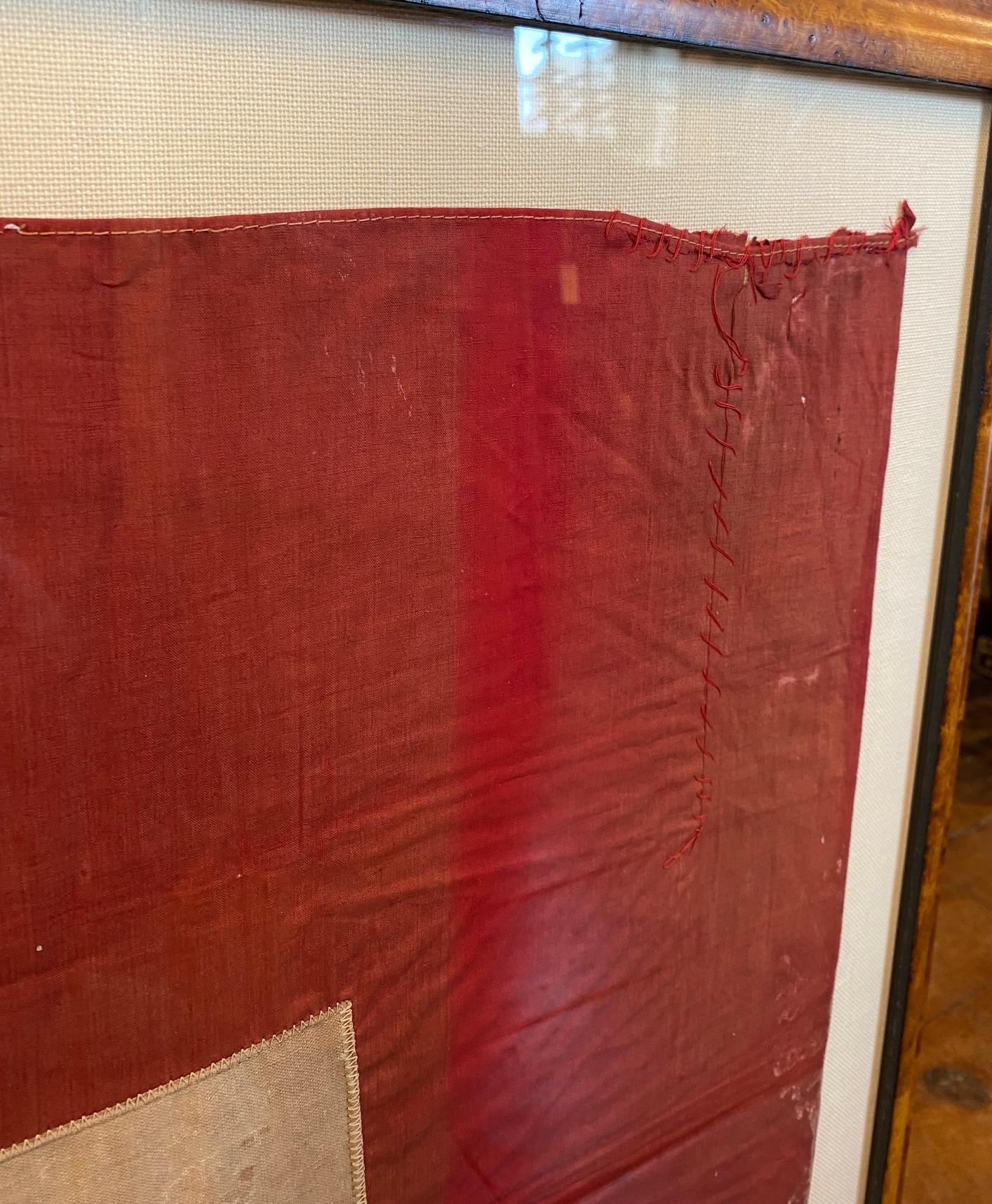 red white and blue flag with one star