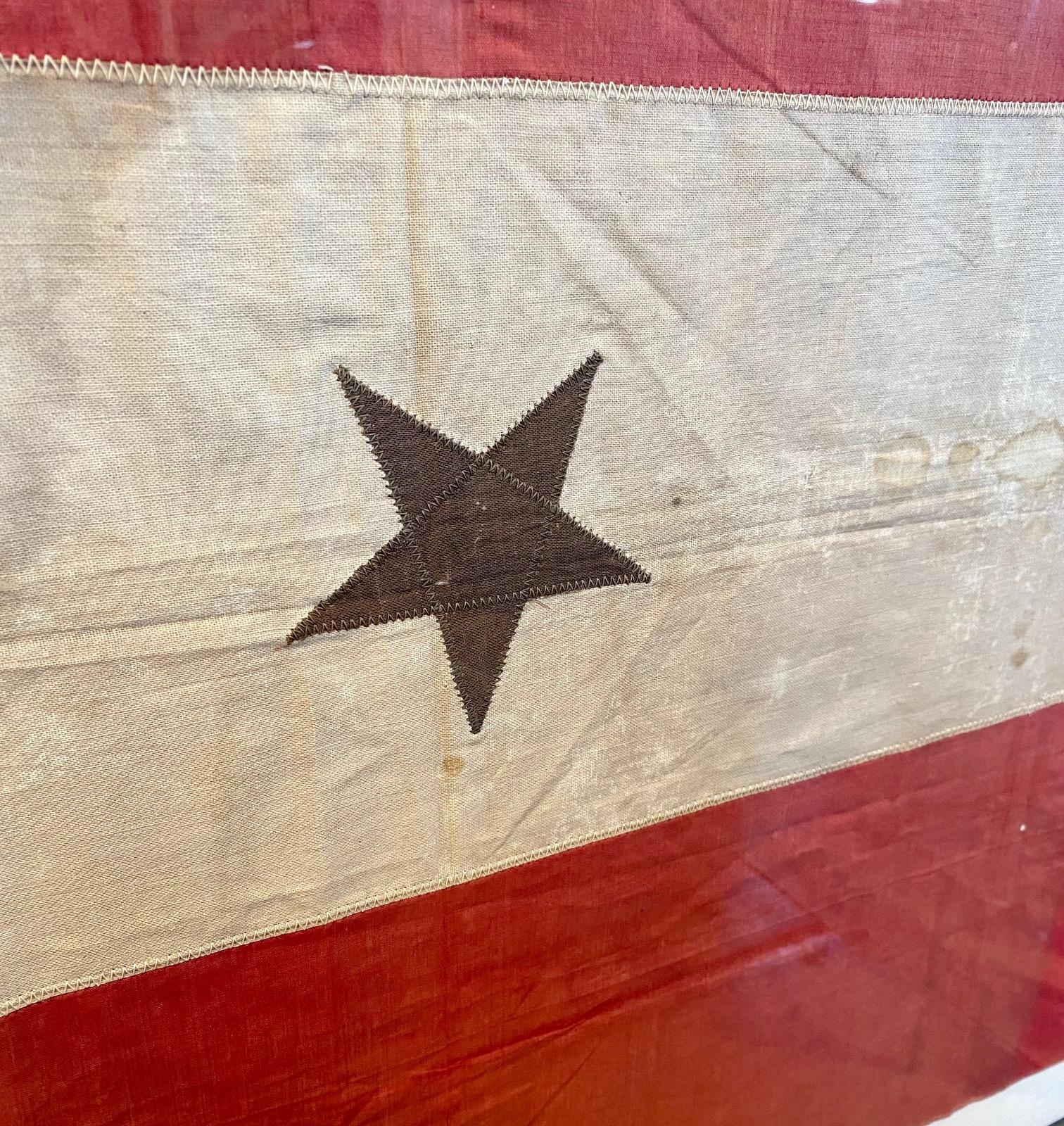 red white and blue with one star