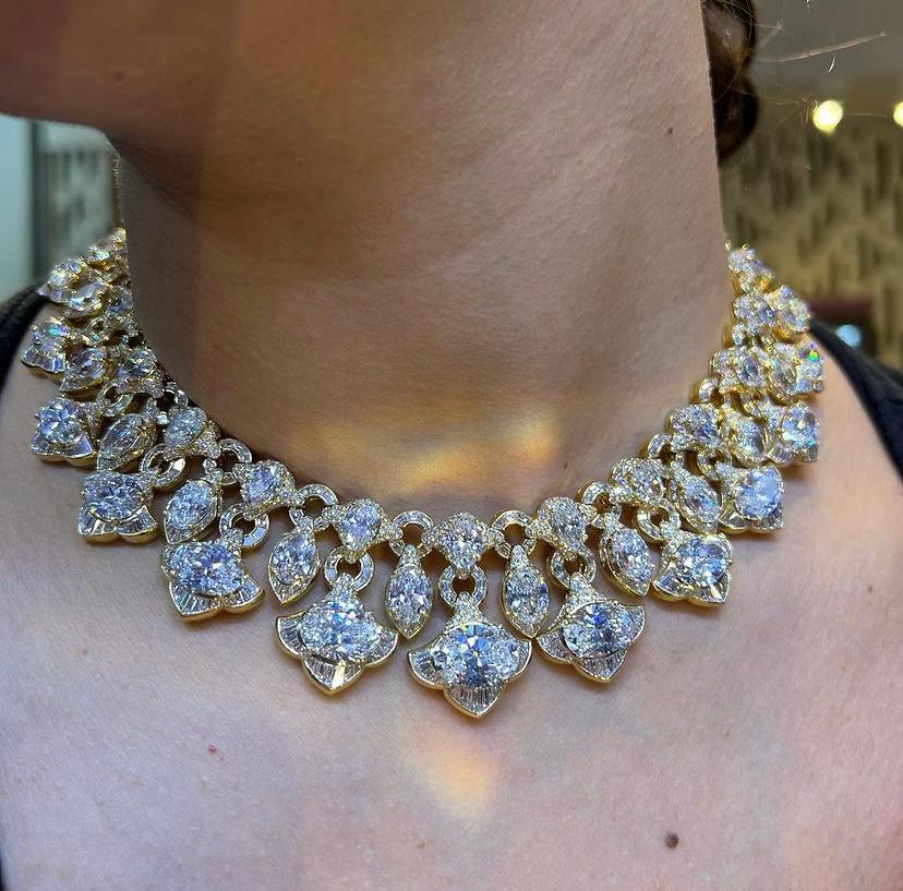 Historic Bulgari Diamond Necklace & Earrings Set

A spectacular necklace and matching earrings set featuring a fringe design. The necklace consists of 59 oval-cut diamonds for total approximate weight of 140 carats and the earrings consist of 8