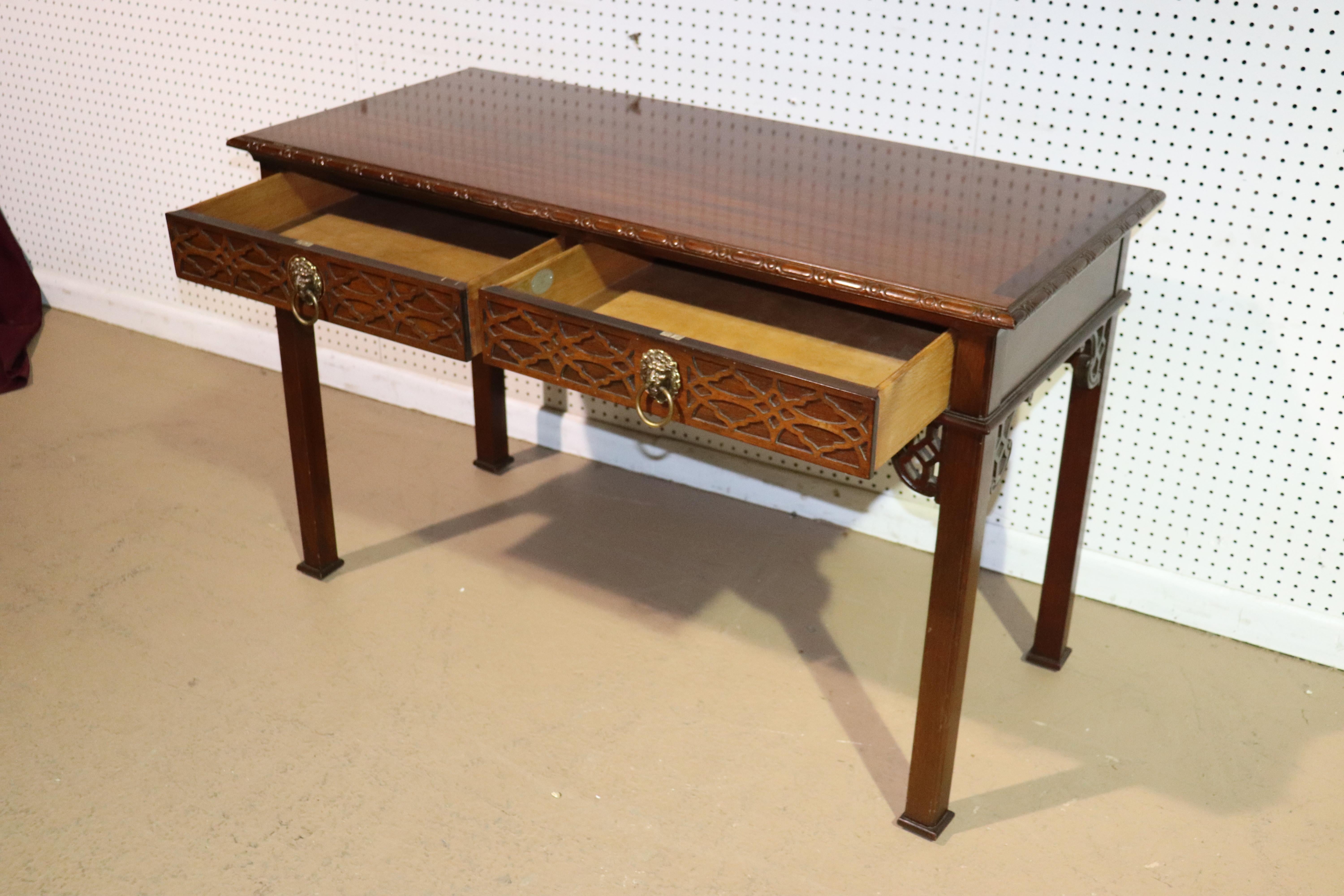 This is a fine quality desk by Baker furniture company. The desk is in very good condition with minor wear and small dings, or scratches but nothing at all obvious. The desk dates to the 1980s and measures 48 wide x 22 deep x 30 inches tall.