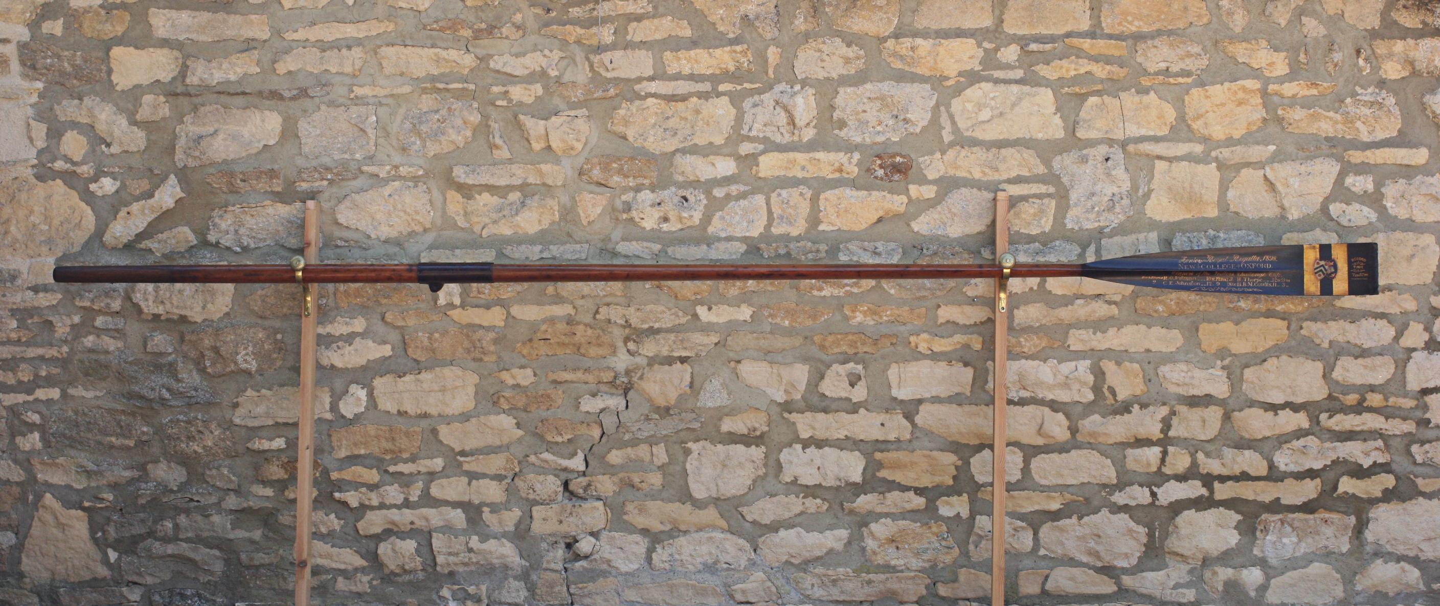 Antique Rowing Oar, 1898 New College Oxford, Henley Royal Regatta.
The full-length oar is an original traditional presentation rowing oar with gilt calligraphy and college insignias. It belonged to Robert Octavius Pitman who rowed whilst at New