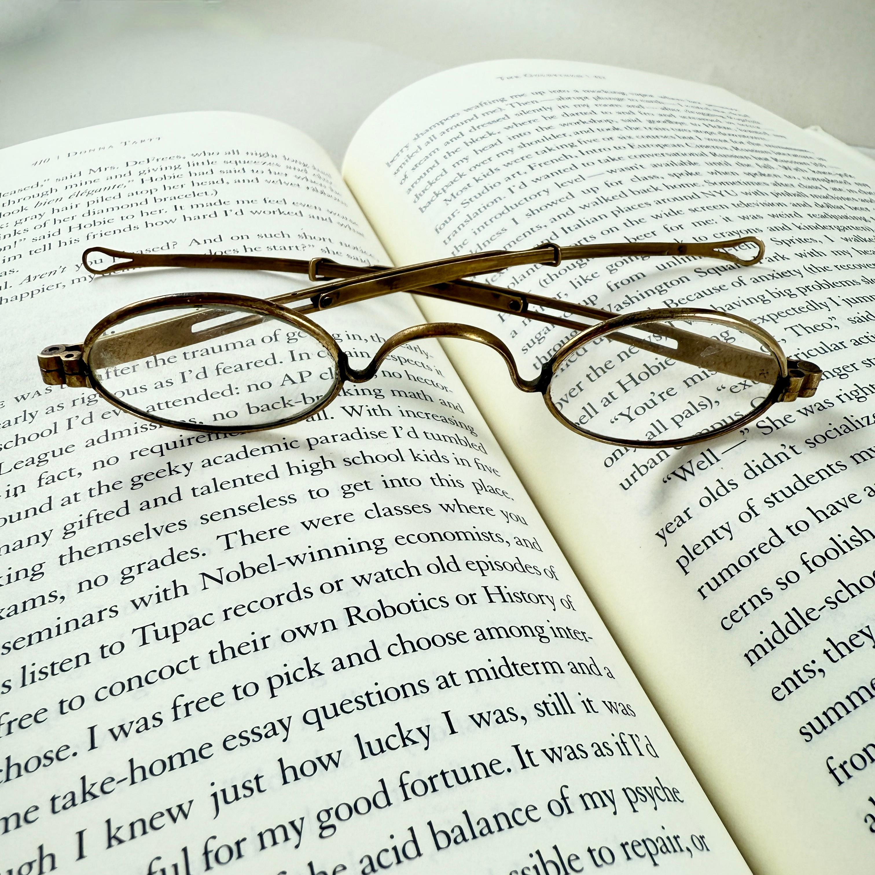 A delicate pair of handmade brass ladies magnifying wire rim eye glasses from the American Civil War era, circa 1860.

A unique pair of antique spectacles, cleverly designed with extendable temple arms for a perfect fit. The arms can be retracted
